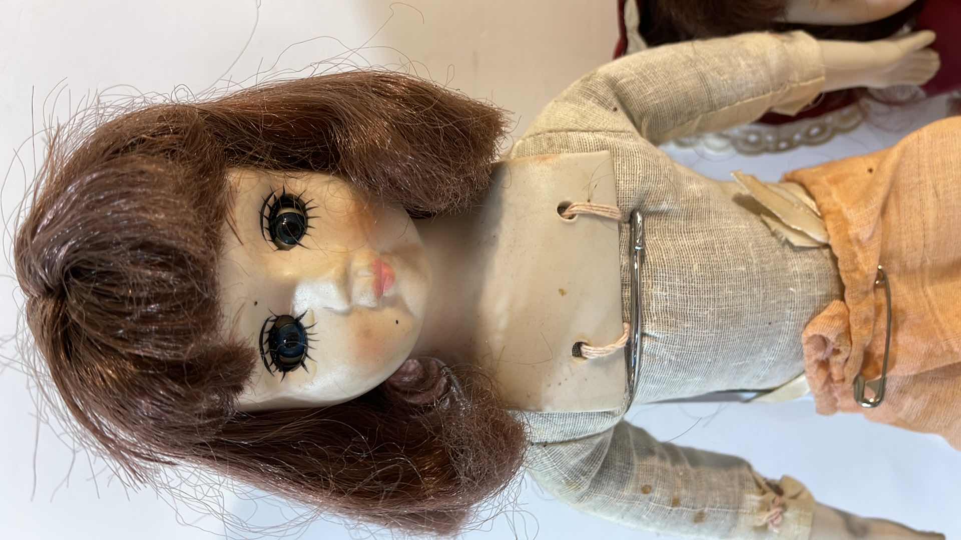 Photo 1 of ANTIQUE / VINTAGE PORCELAIN UNMARKED SOCKET HEAD DOLLS W/ CLOTH BODYS AND SLEEPY EYES