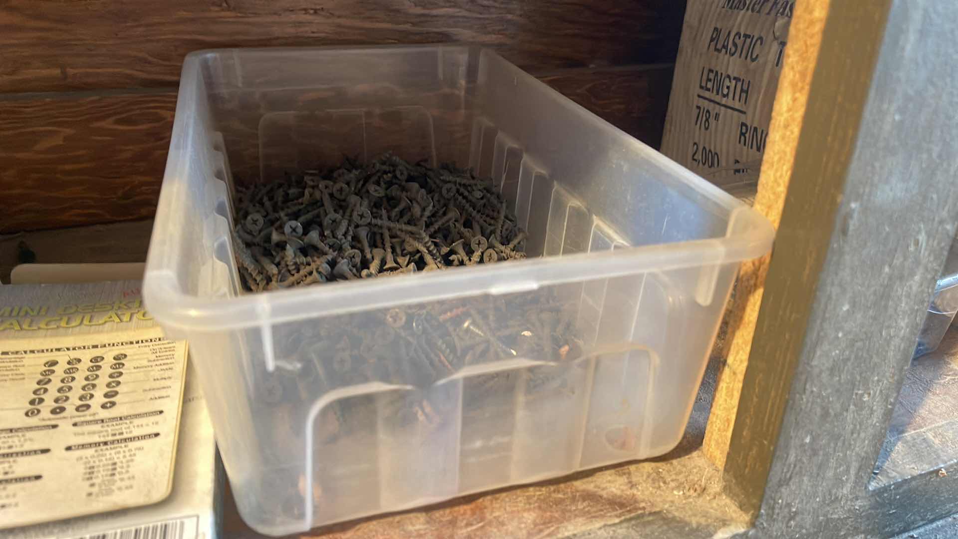 Photo 1 of CONTENTS OF CABINET - SCREWS / LIGHTBULB / CHEMICALS & MORE 