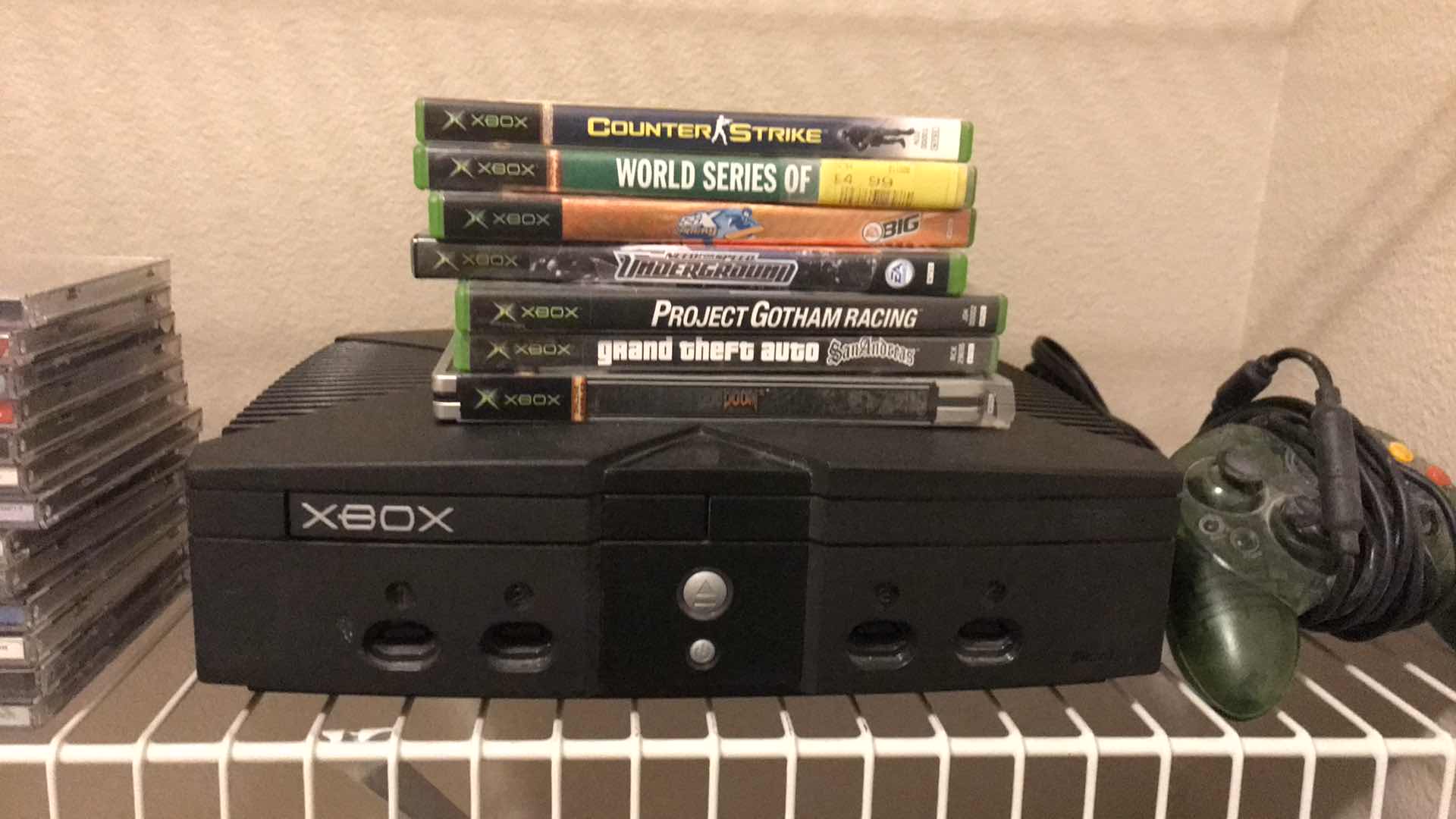 Photo 1 of XBOX WITH GAMES AND CONTROLLER