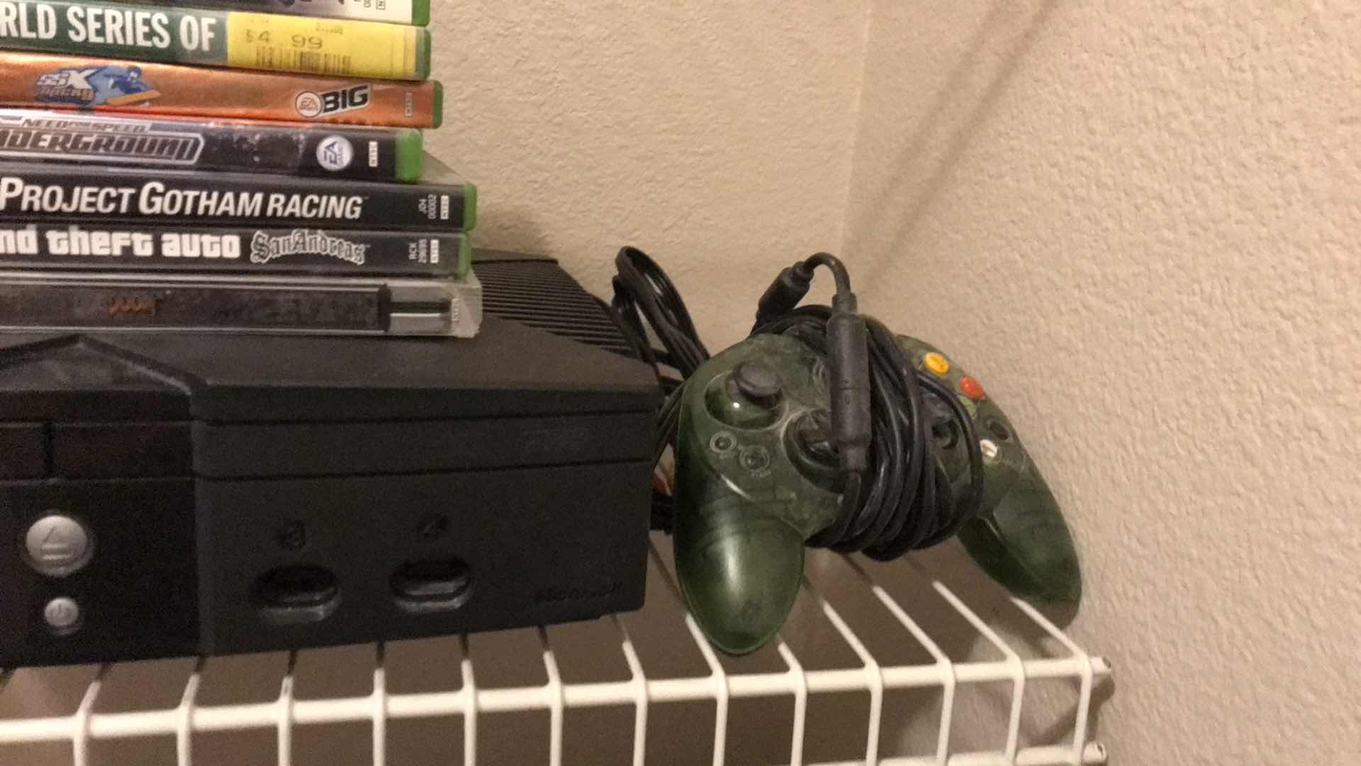 Photo 1 of XBOX WITH GAMES AND CONTROLLER