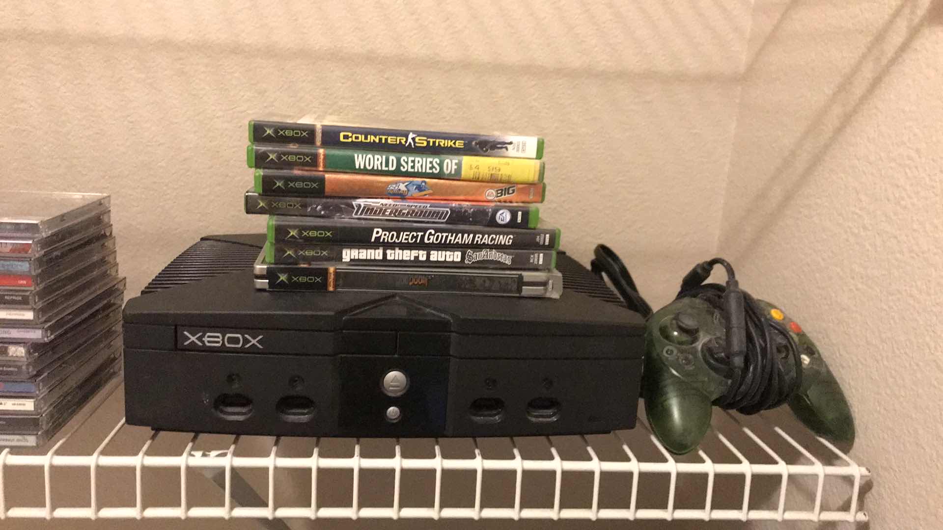 Photo 1 of XBOX WITH GAMES AND CONTROLLER