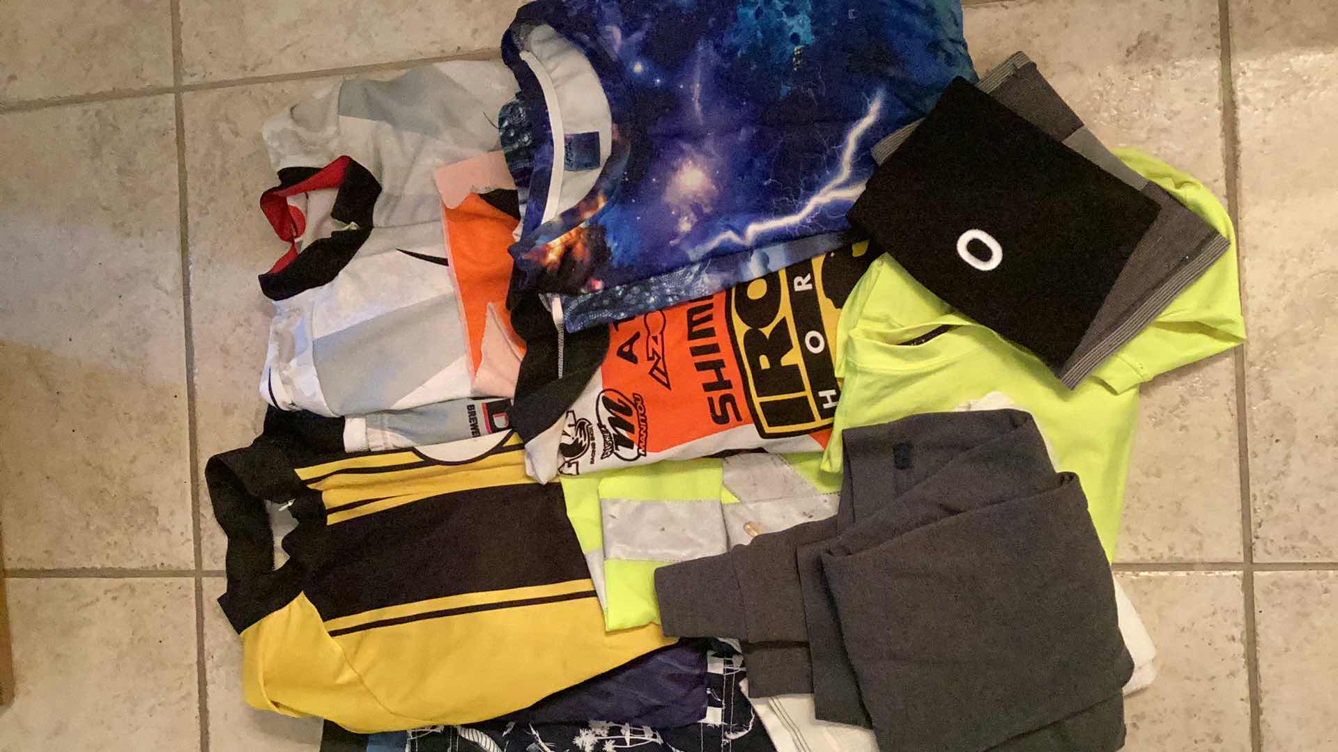 Photo 1 of SPORTY SHIRTS & BATHING SUITS