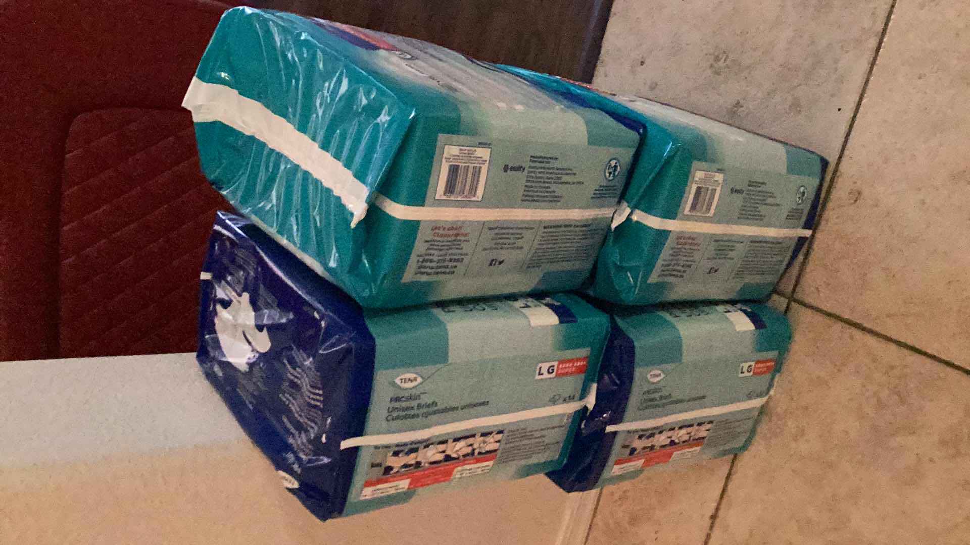 Photo 1 of TENA PRO SKIN UNISEX BRIEFS // ADULT DIAPERS- LARGE