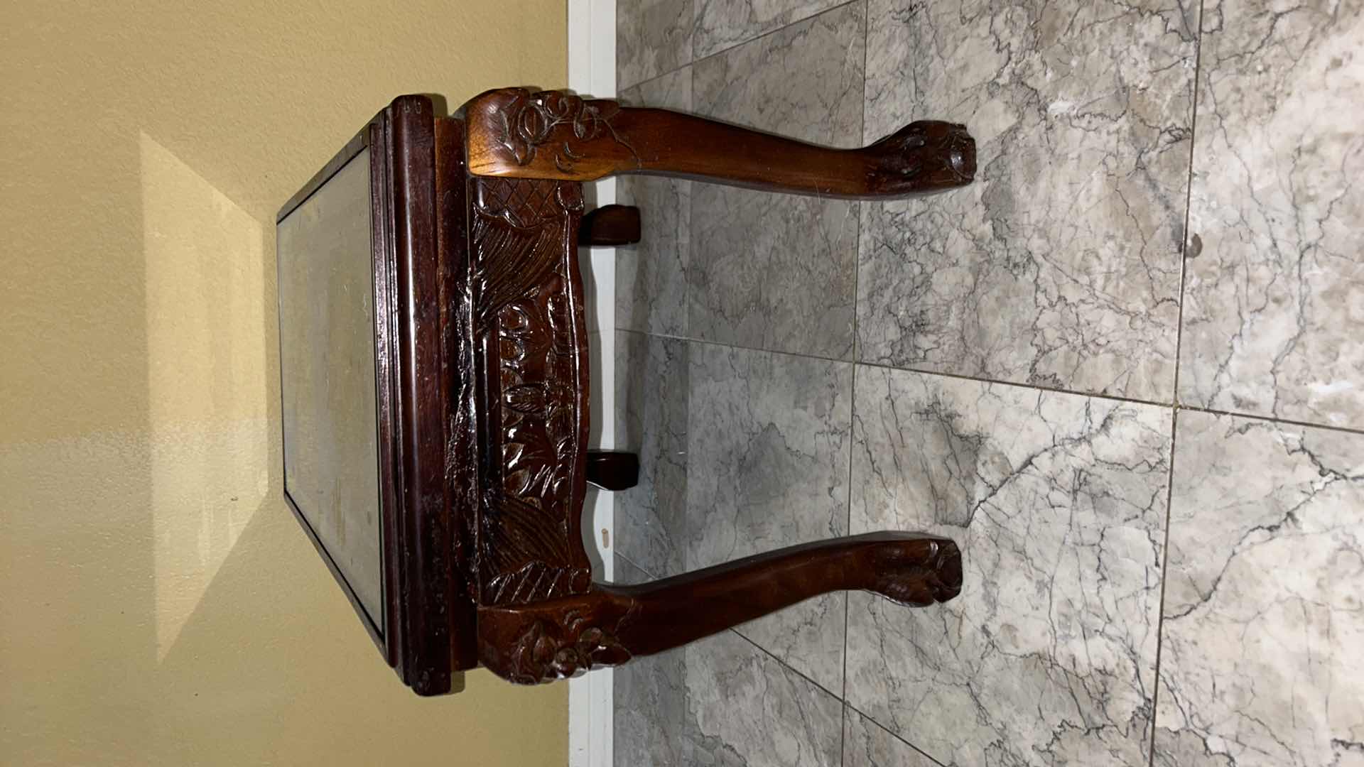 Photo 1 of CARVED WOOD TABLE WITH GLASS TOP, 24” x 13” H16.5”