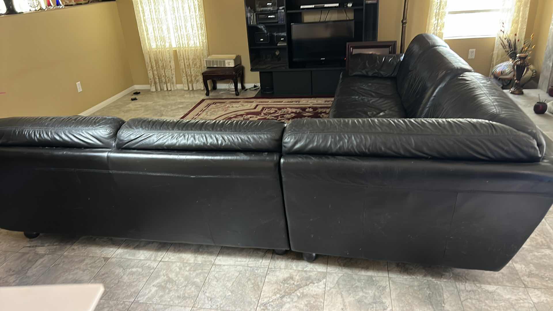 Photo 1 of BLACK LEATHER 3 PIECE SOFA SECTIONAL 2 PIECES 73”
x 39” H32”, CORNER 37” WIDE ( SEE NOTES)