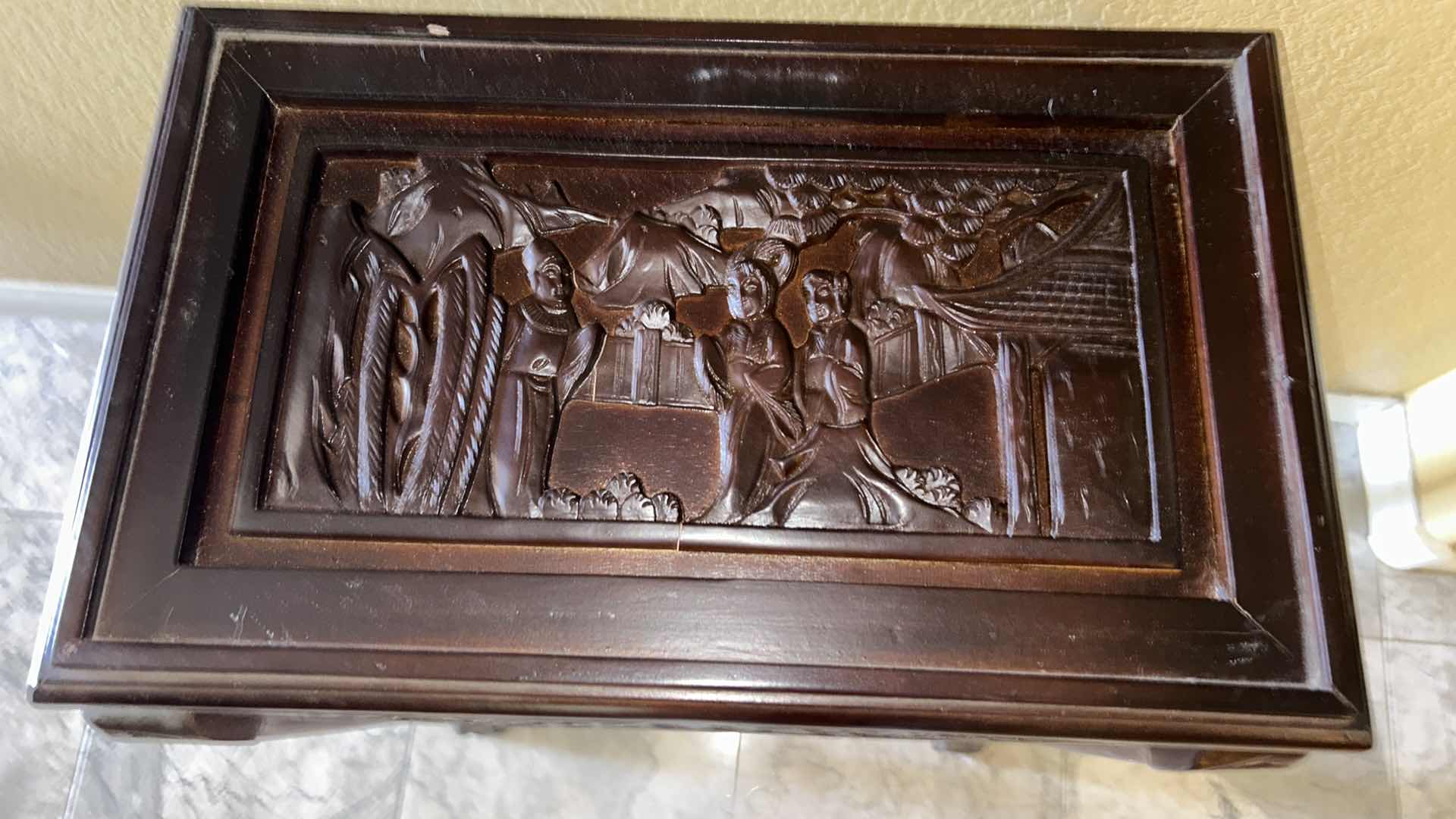 Photo 1 of CARVED WOOD TABLE WITH GLASS TOP, 19” x 12” H27”