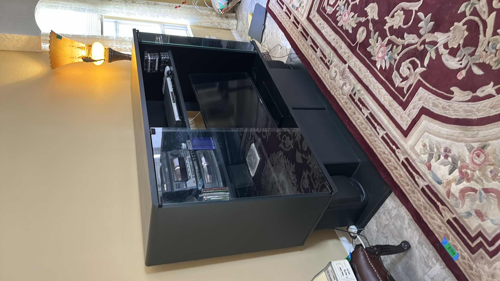 Photo 1 of BLACK ENTERTAINMENT CENTER 58” x 20” x H48” (CONTENTS NOT INCLUDED)