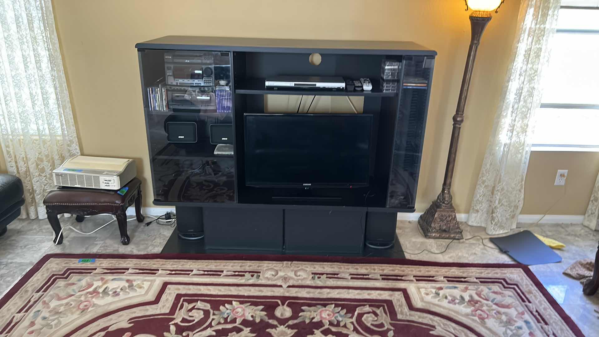 Photo 1 of BLACK ENTERTAINMENT CENTER 58” x 20” x H48” (CONTENTS NOT INCLUDED)