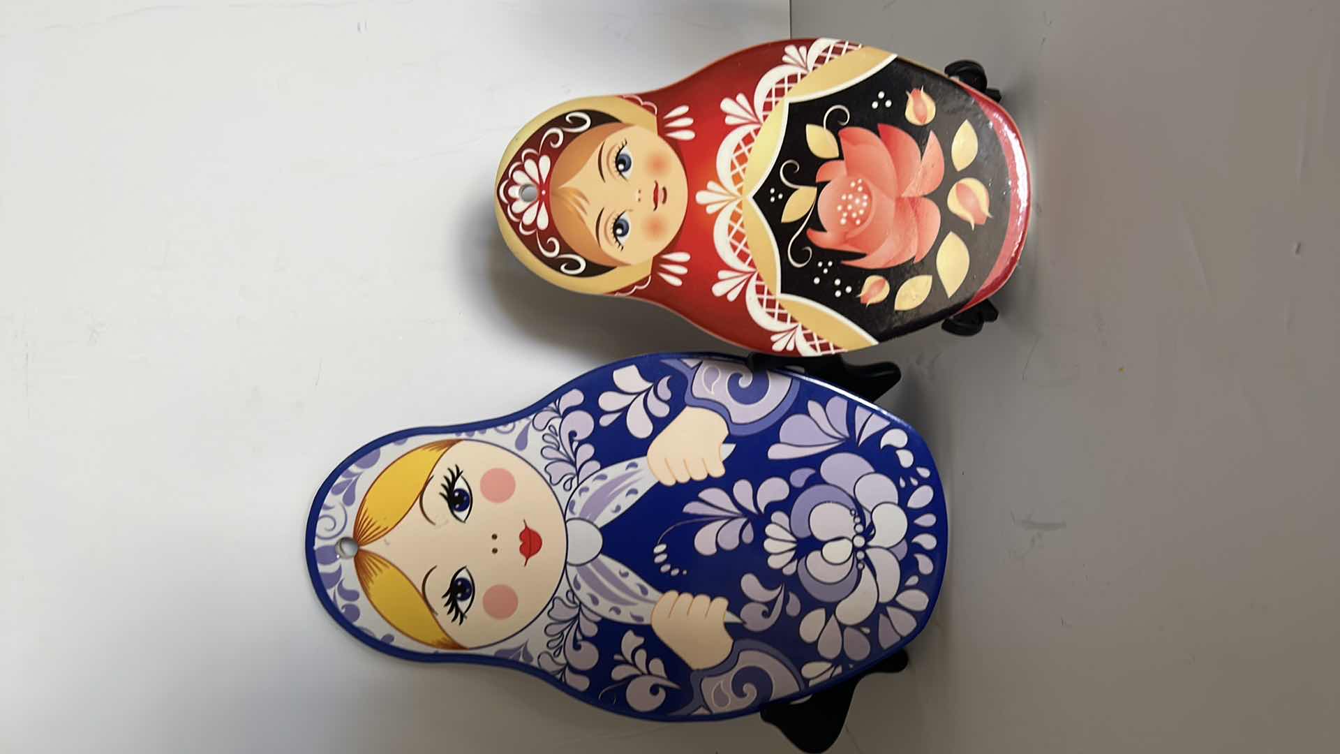 Photo 1 of RUSSIAN NESTING FOLLS AND TWO TRIVETS (STANDS NOT INCLUDED)