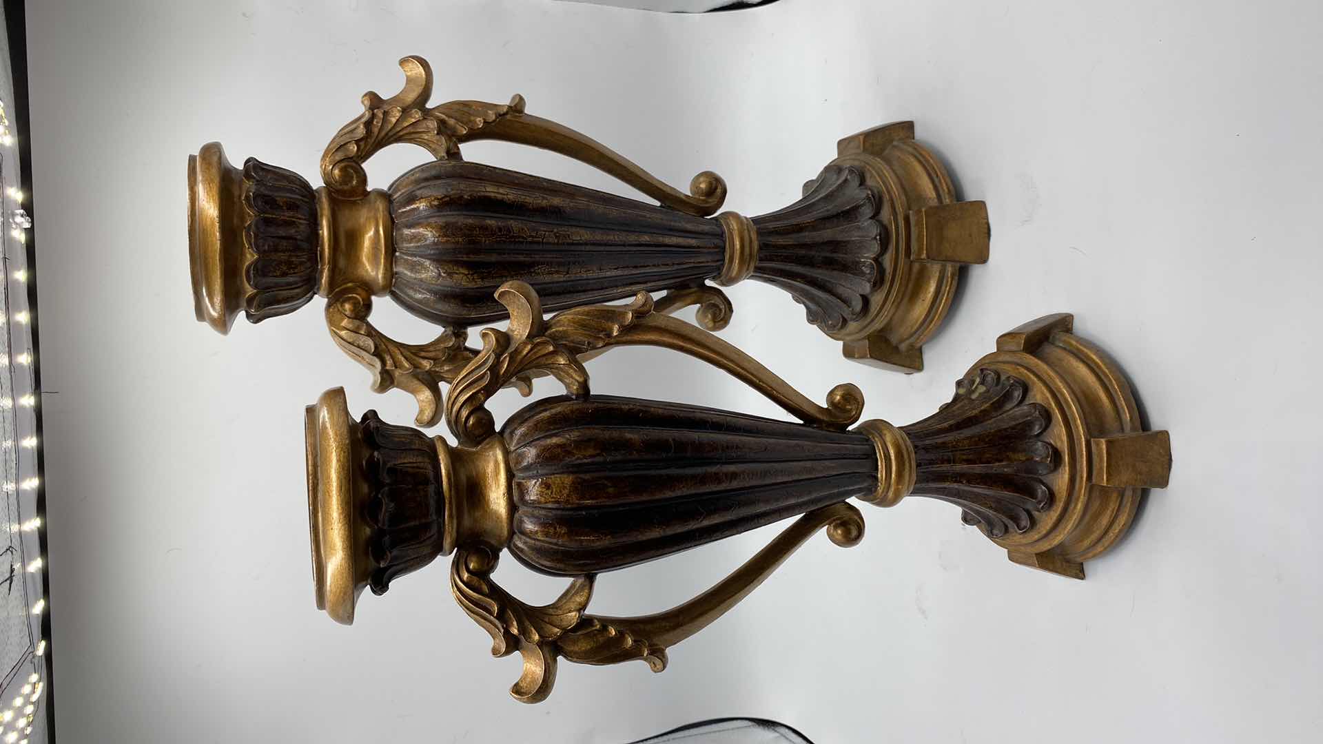 Photo 1 of PAIR OF RESIN CANDLESTICKS TALLEST 18”