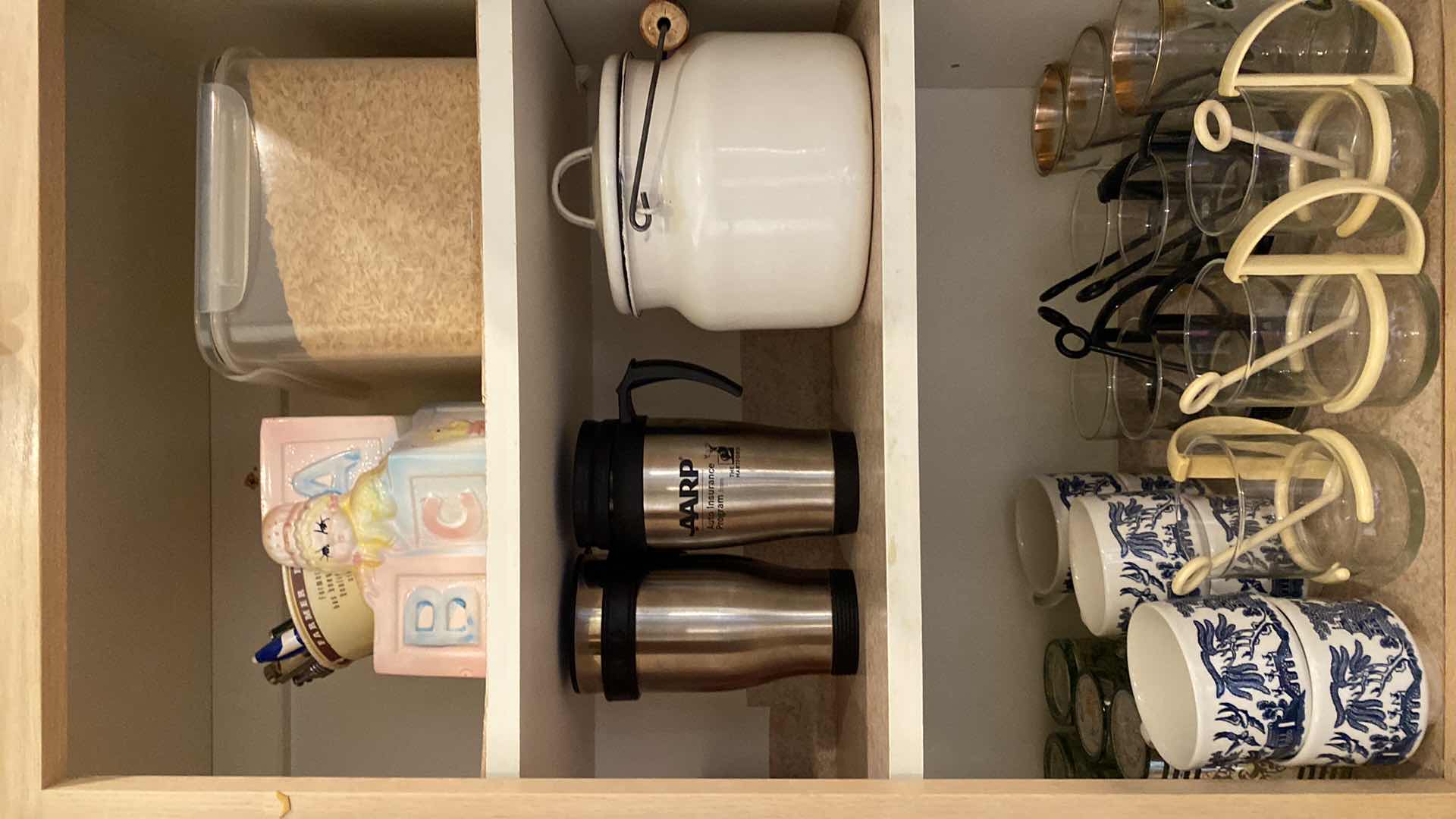 Photo 1 of CONTENTS OF KITCHEN CABINET GLASSWARE CUPS AND MORE