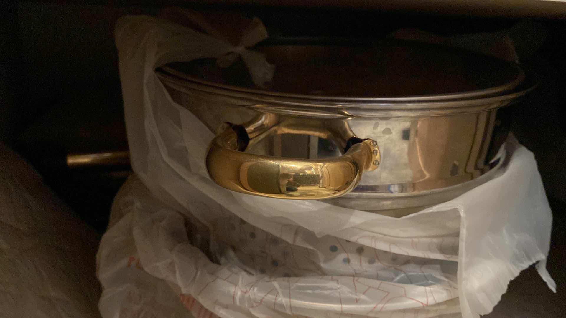 Photo 1 of CONTENTS OF KITCHEN CABINET POTS AND PANS