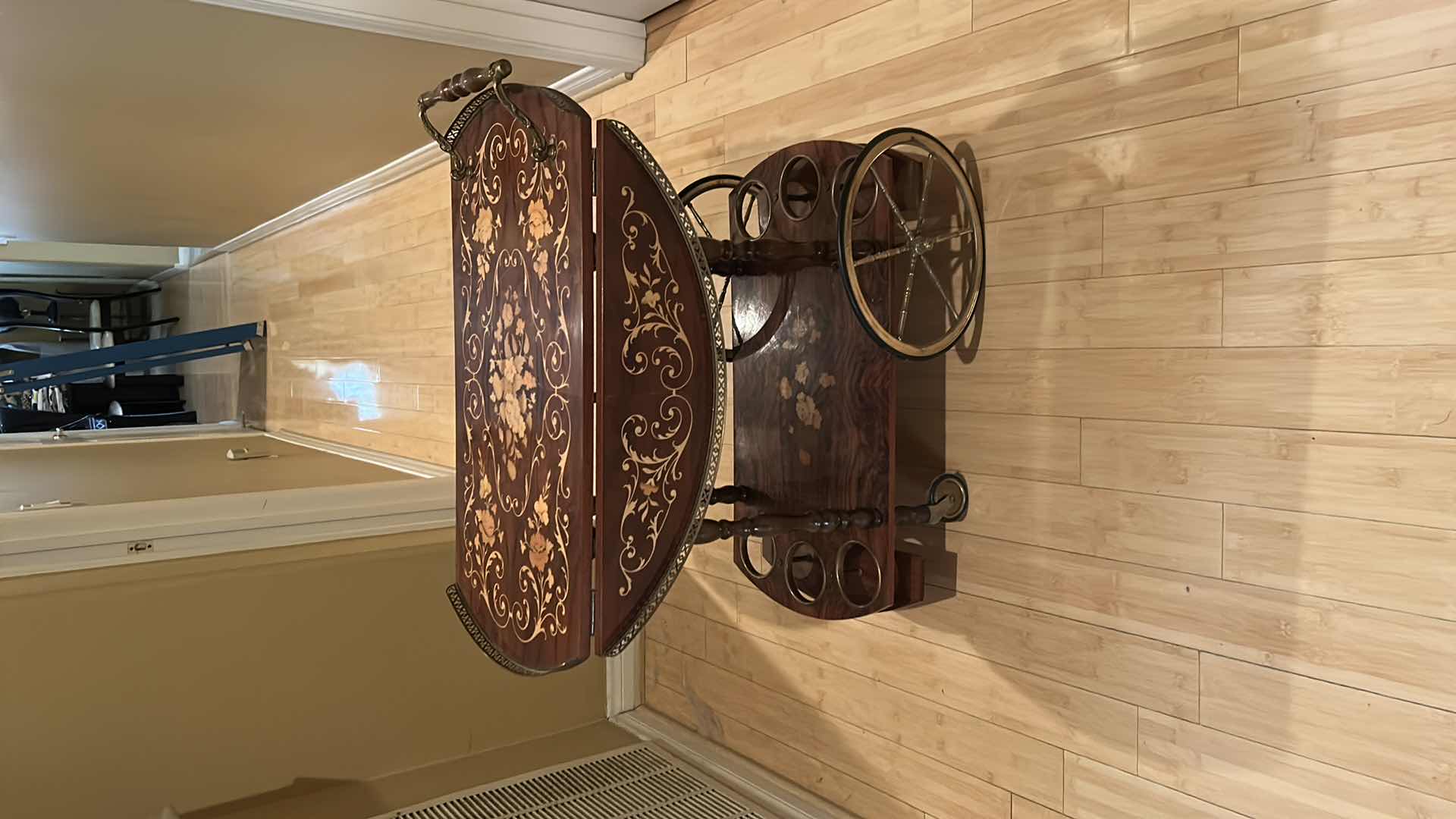 Photo 1 of VINTAGE ITALIAN SORRENTO WOOD DROP LEAF TABLE WITH INLAID COCKTAIL CART TABLE OPENED 30” ROUND CLOSED 30” x 17.5” x H27”
TABLETOP NEEDS GLUE)