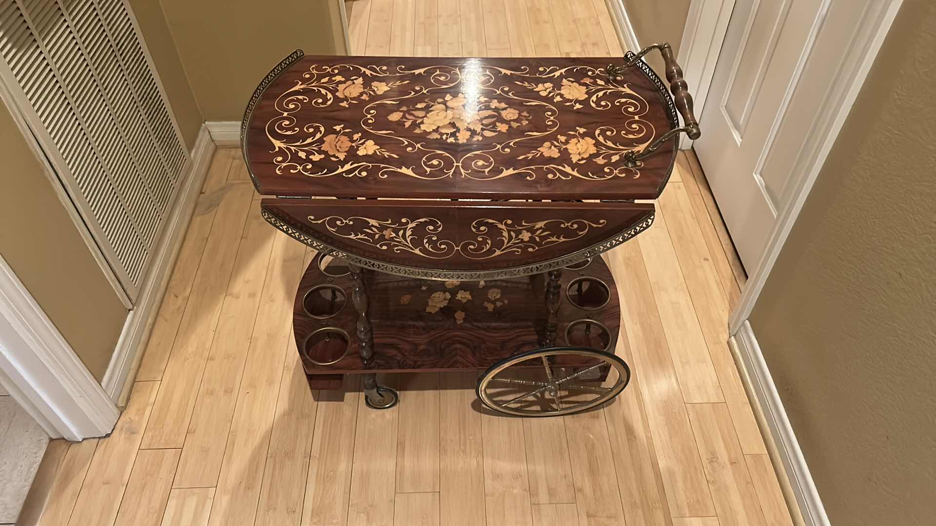 Photo 1 of VINTAGE ITALIAN SORRENTO WOOD DROP LEAF TABLE WITH INLAID COCKTAIL CART TABLE OPENED 30” ROUND CLOSED 30” x 17.5” x H27”
TABLETOP NEEDS GLUE)