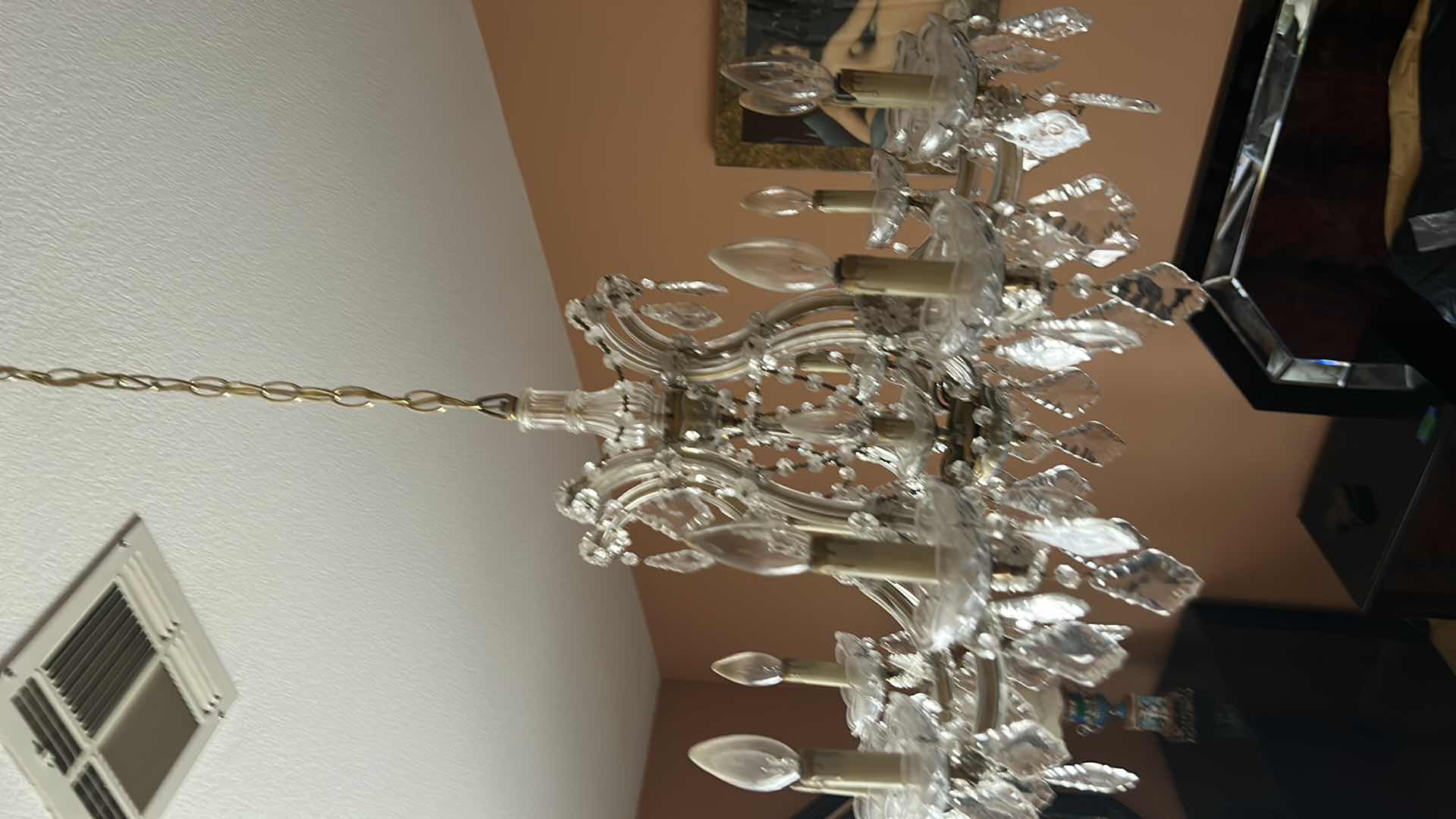 Photo 1 of VINTAGE CRYSTAL CHANDELIER W EXTRA CRYSTALS 28” x 21” (MEASUREMENT WITHOUT CHAIN)