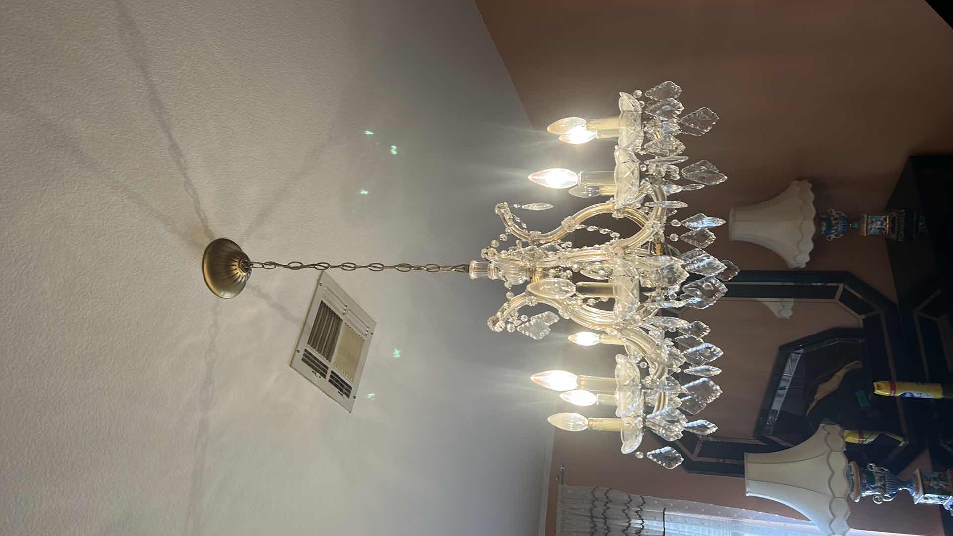 Photo 1 of VINTAGE CRYSTAL CHANDELIER W EXTRA CRYSTALS 28” x 21” (MEASUREMENT WITHOUT CHAIN)