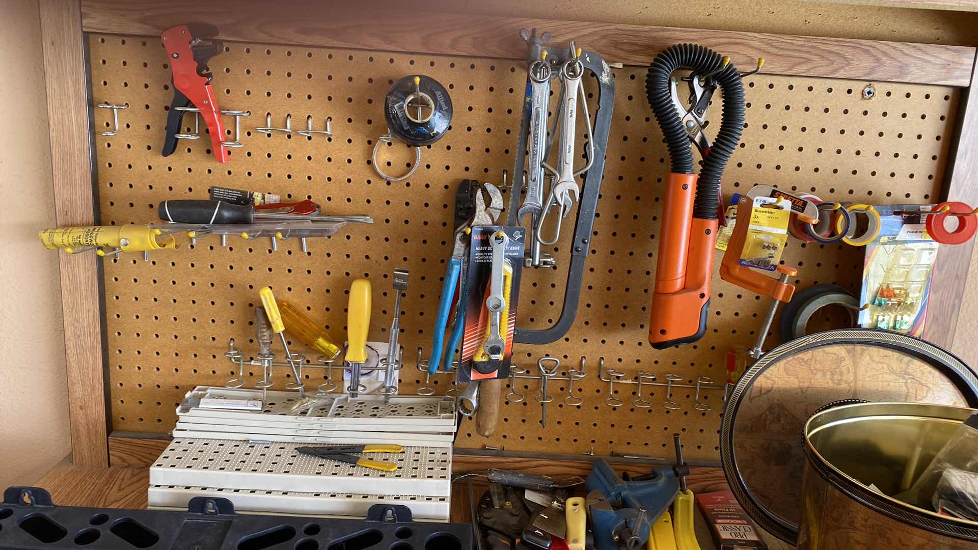 Photo 1 of TOOLS ON WALL AND TOP SHELF OF CABINET GARAGE