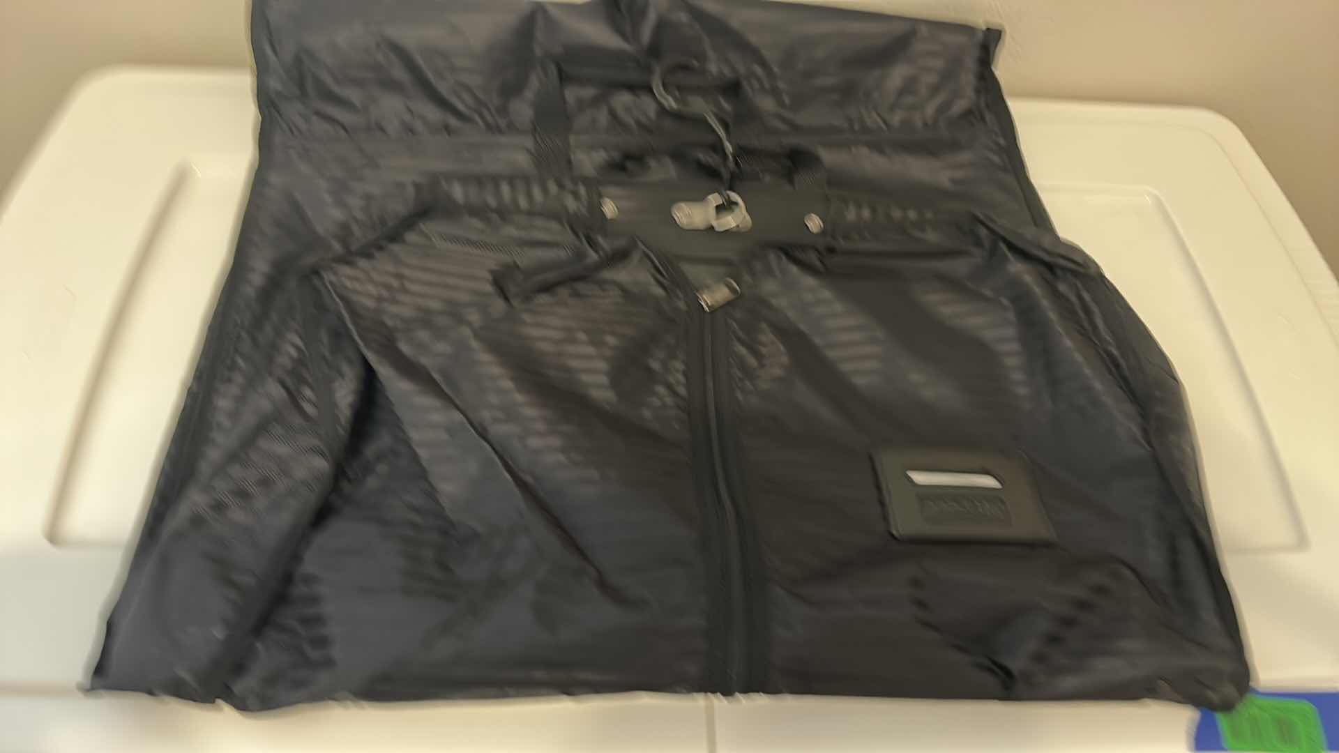 Photo 1 of 3 STORAGE CONTAINERS SMALLEST 49” x 22” x 6” AND GARMET BAG