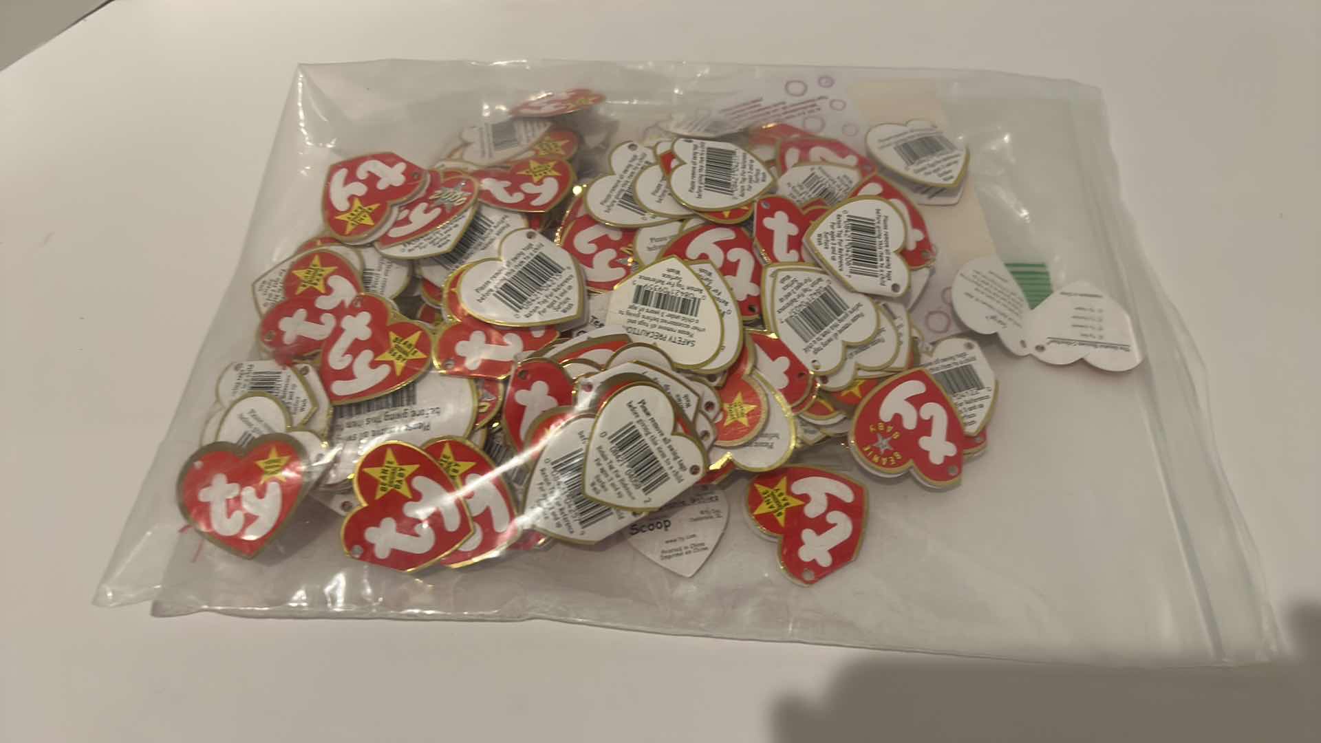 Photo 2 of BAG FULL OF BEANIE BABY TAGS