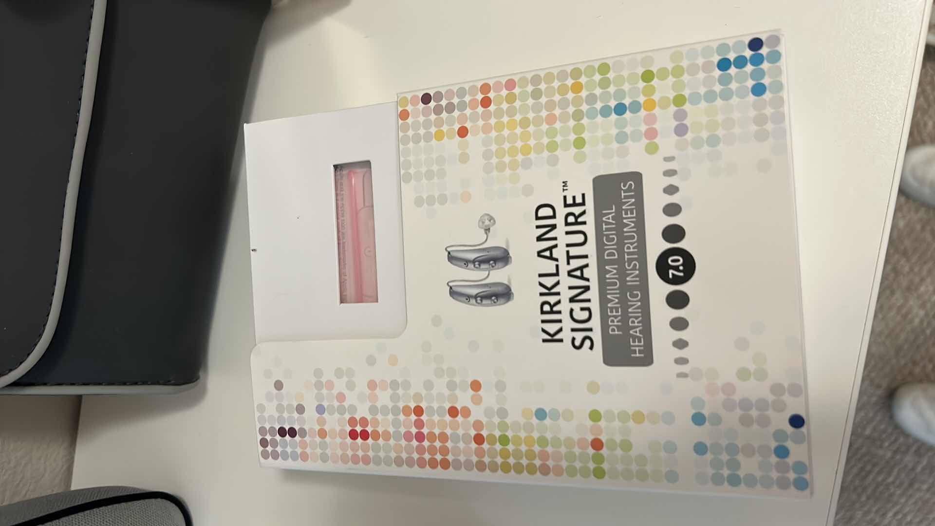 Photo 1 of CONTENTS OF SHELF (HEARING AIDS AND CLEANER NECK CUSHION ROWENTA ULTRA STEAM AND MORE)