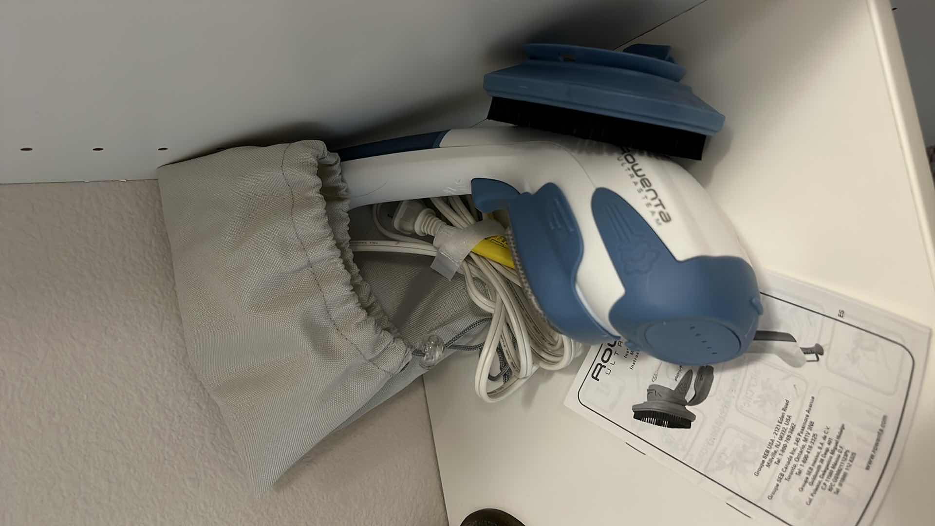 Photo 1 of CONTENTS OF SHELF (HEARING AIDS AND CLEANER NECK CUSHION ROWENTA ULTRA STEAM AND MORE)