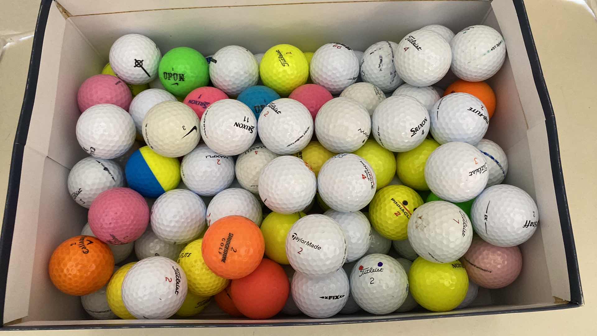 Photo 1 of BOX OF 100 USED GOLF BALLS
