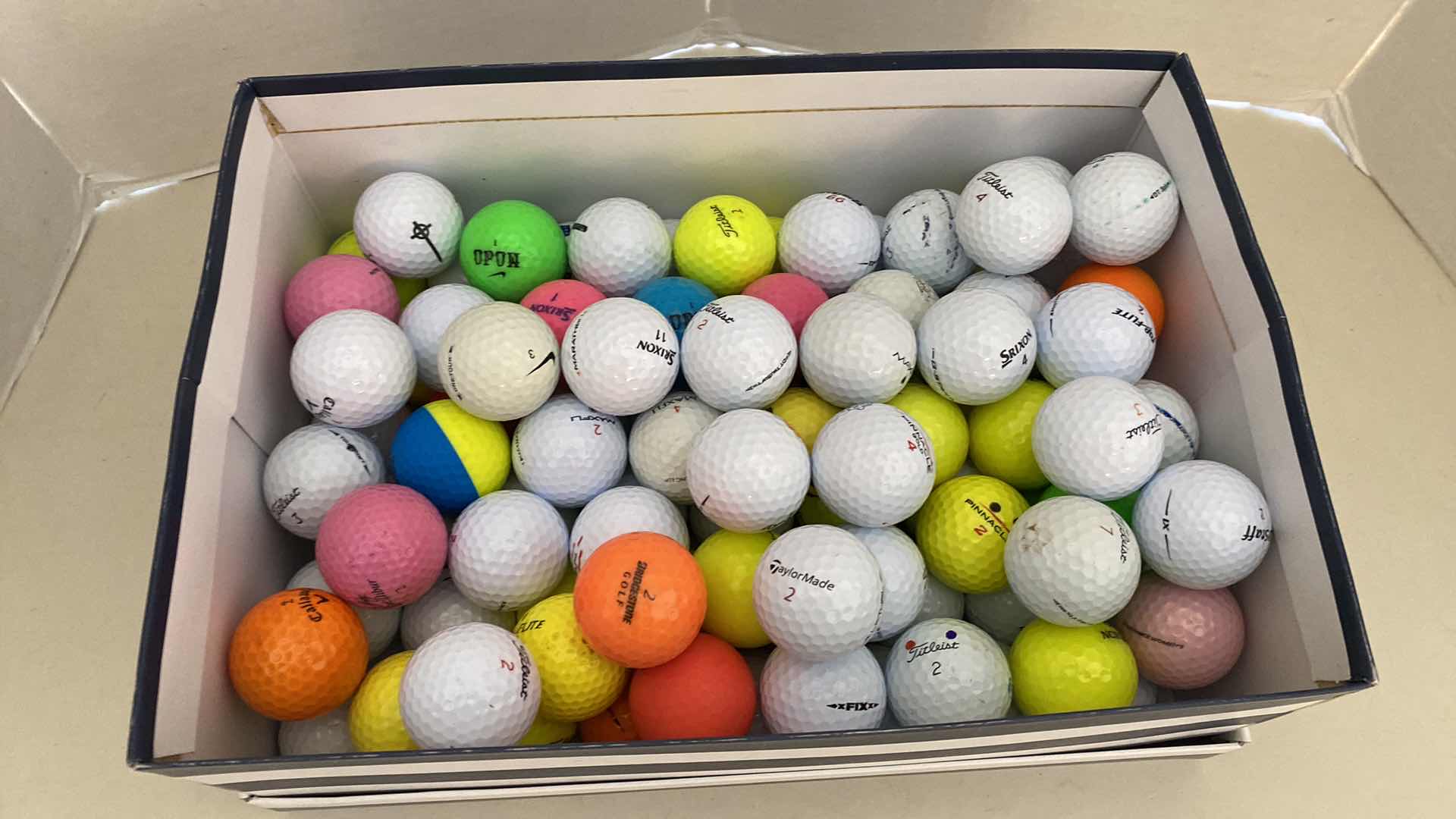 Photo 1 of BOX OF 100 USED GOLF BALLS