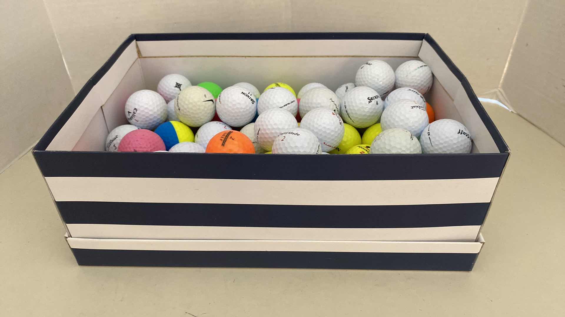 Photo 1 of BOX OF 100 USED GOLF BALLS