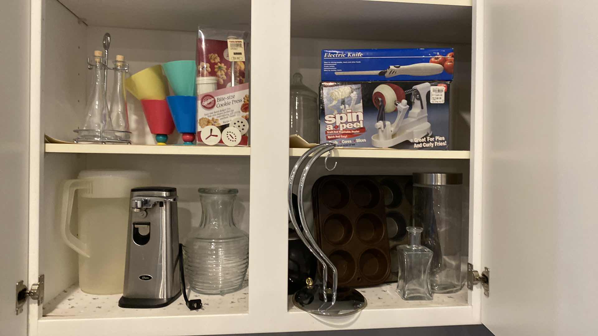 Photo 1 of CONTENTS OF KITCHEN CABINET