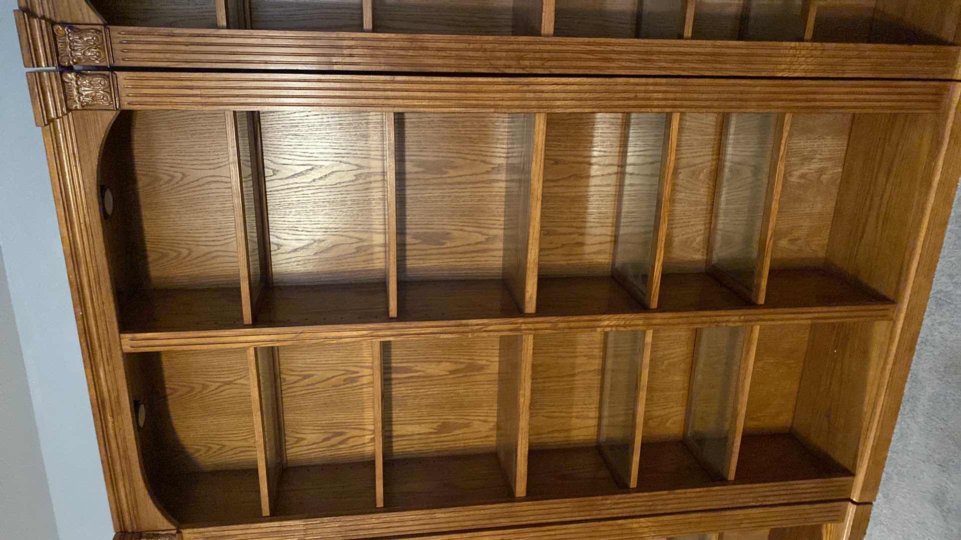 Photo 1 of OAK LIGHTED 6 SHELF BOOK CASE 48” X 13” H84” (TOTAL OF 5 AVAILABLE EACH SOLD SEPARATELY