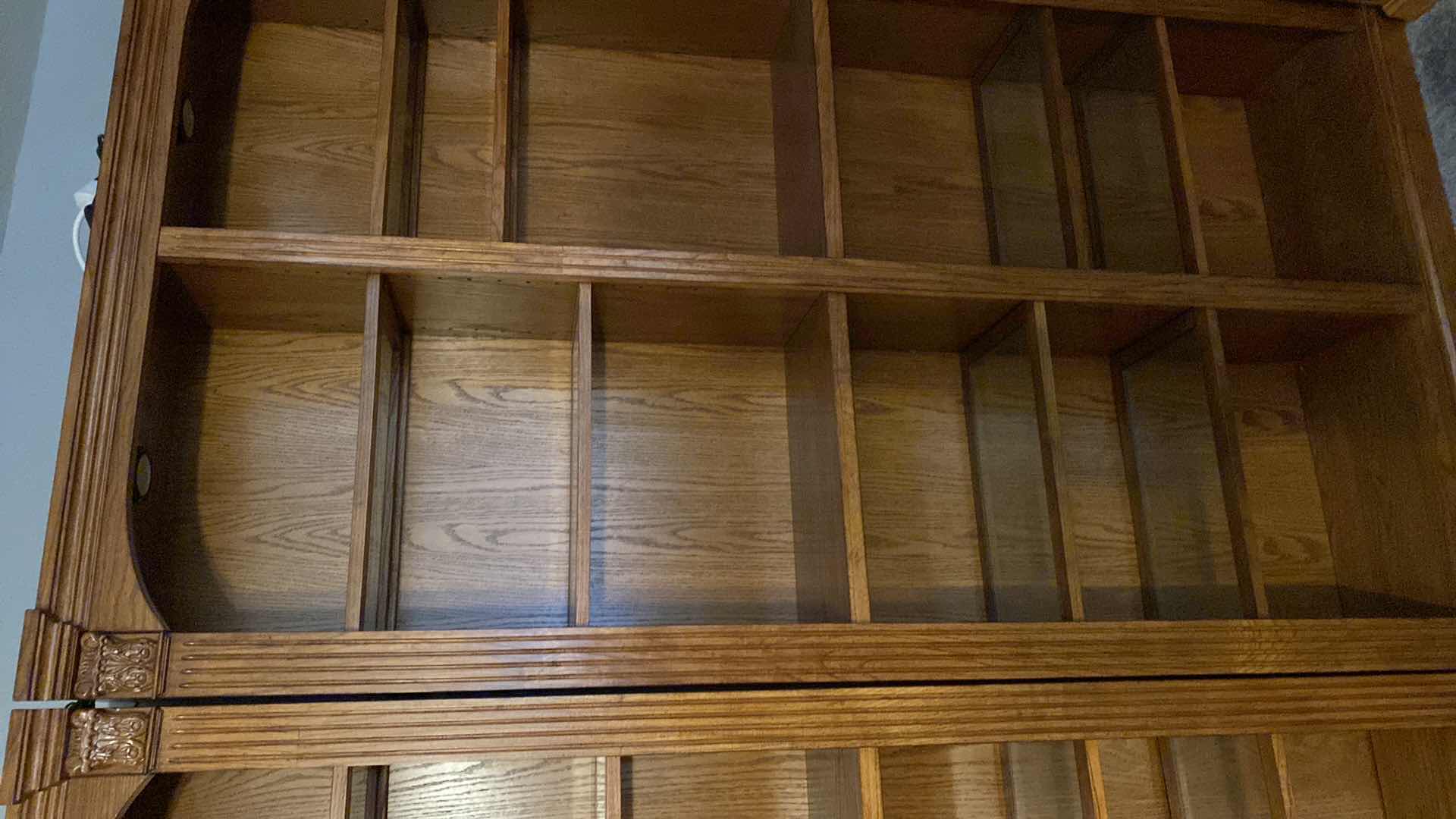 Photo 1 of OAK LIGHTED 6 SHELF BOOK CASE 48” X 13” H84” (TOTAL OF 5 AVAILABLE EACH SOLD SEPARATELY