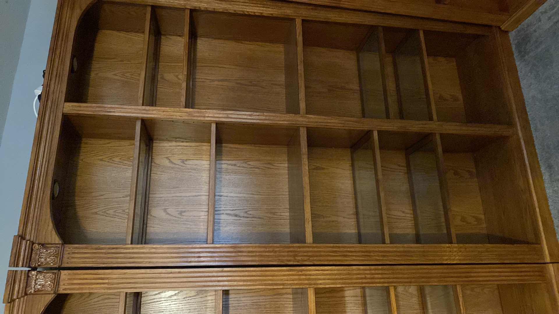 Photo 1 of OAK LIGHTED 6 SHELF BOOK CASE 48” X 13” H84” (TOTAL OF 5 AVAILABLE EACH SOLD SEPARATELY