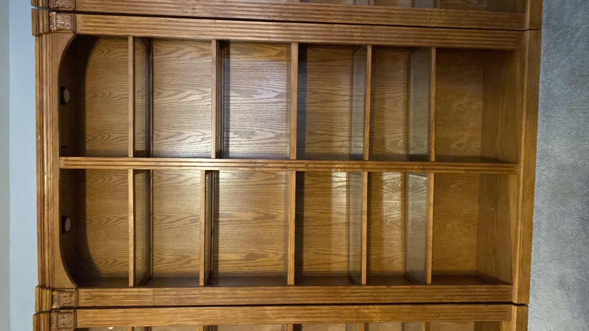 Photo 1 of OAK LIGHTED 6 SHELF BOOK CASE 48” X 13” H84” (TOTAL OF 5 AVAILABLE EACH SOLD SEPARATELY