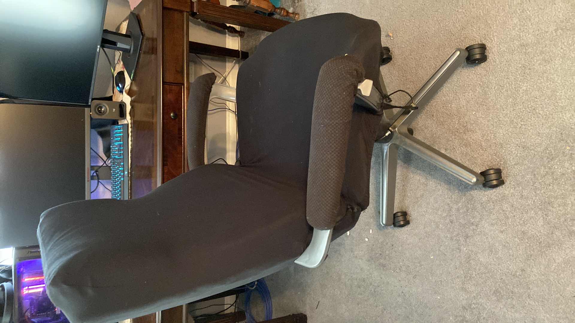 Photo 1 of BLACK DESK CHAIR ON WHEELS