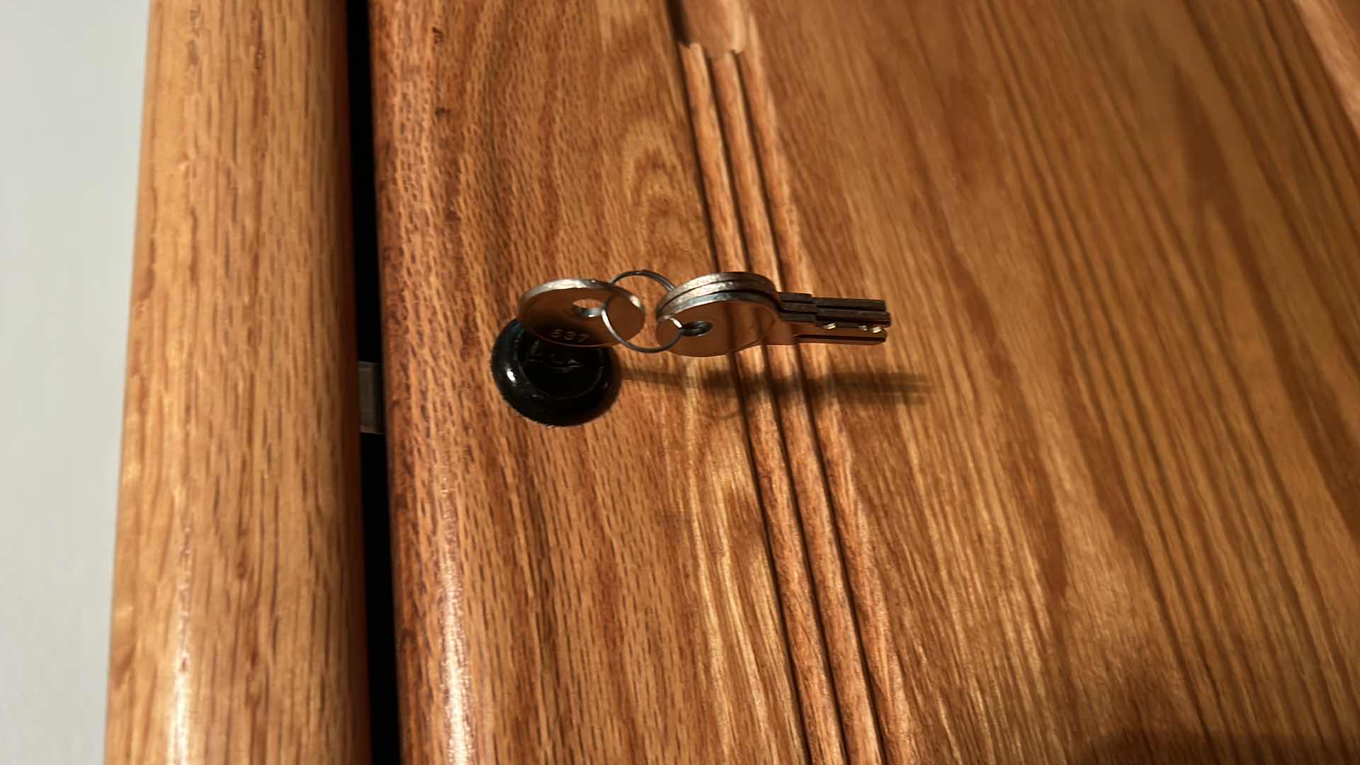 Photo 1 of SOLID WOOD LOCKING FILE CABINET WITH KEY 21” x 25” x H 55” includes file folders