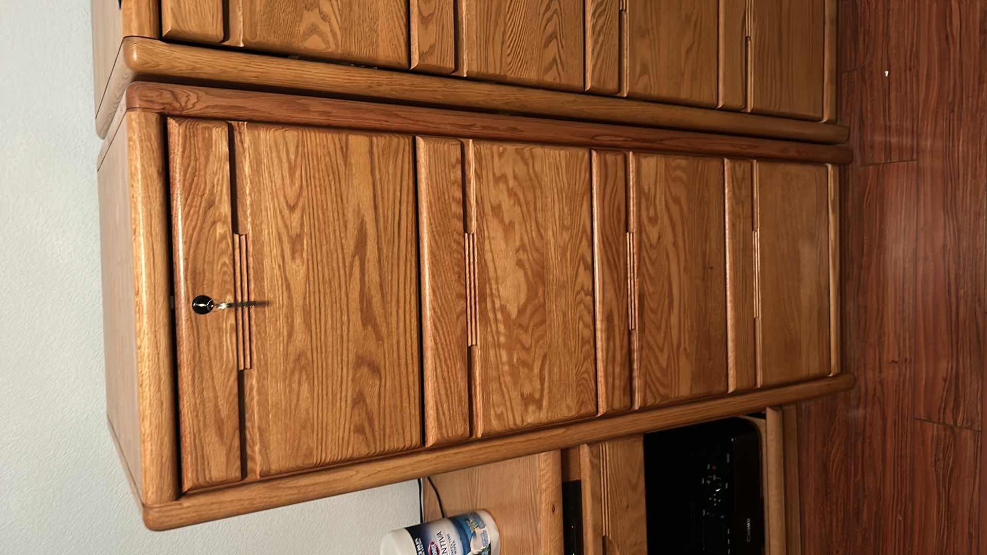 Photo 1 of SOLID WOOD LOCKING FILE CABINET WITH KEY 21” x 25” x H 55” includes file folders