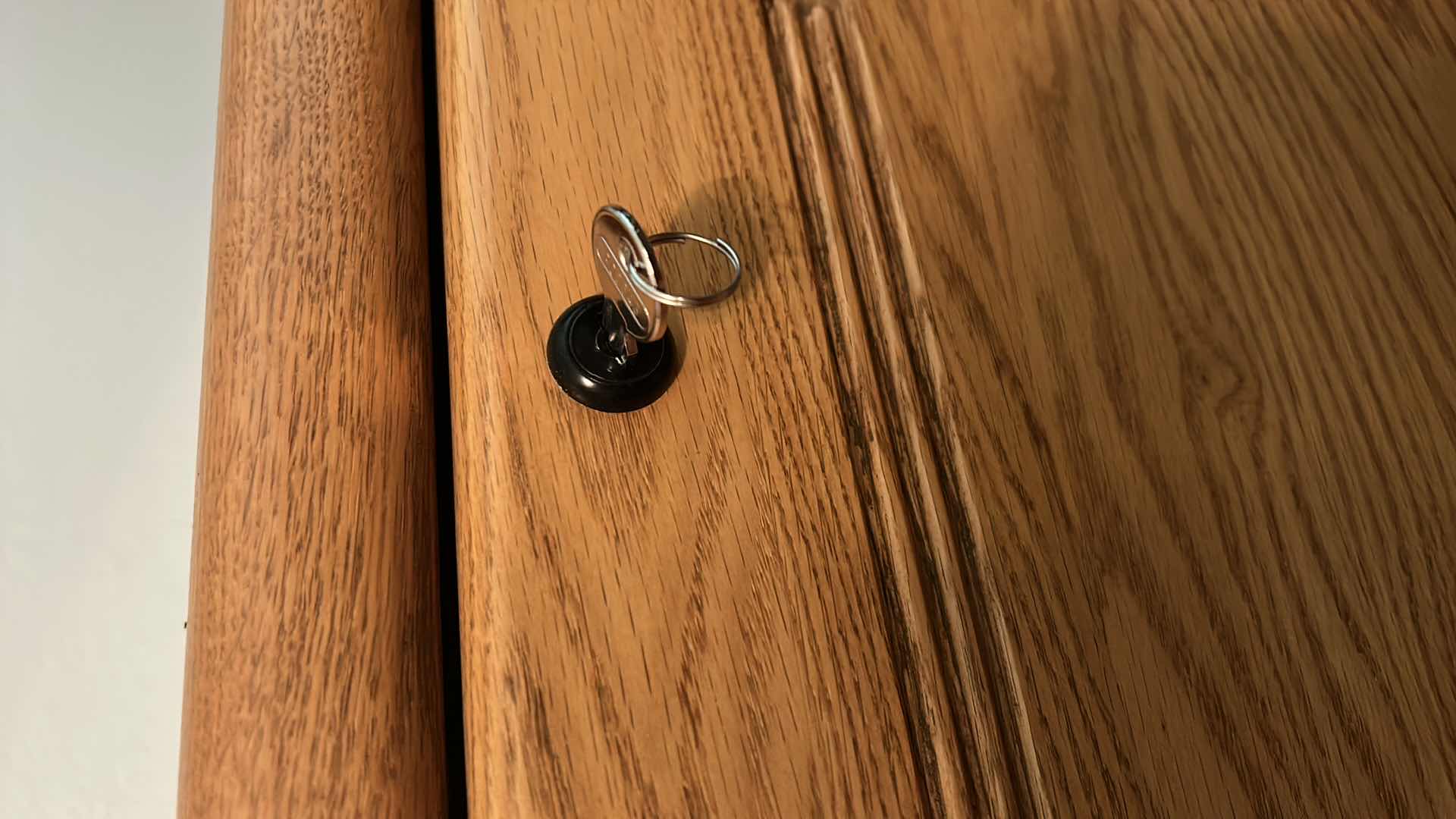 Photo 1 of SOLID WOOD LOCKING FILE CABINET WITH KEY 21” x 25” x H 55” includes file folders