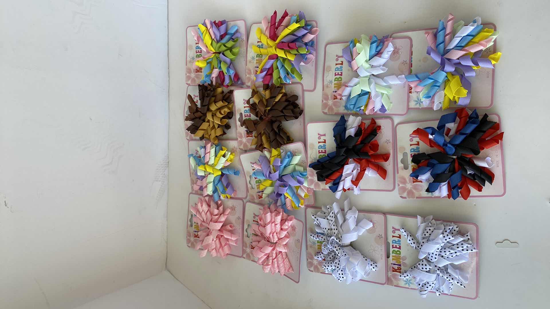 Photo 1 of SUSPENDERS BARRETTES AND PAIR OF KIDS HATS