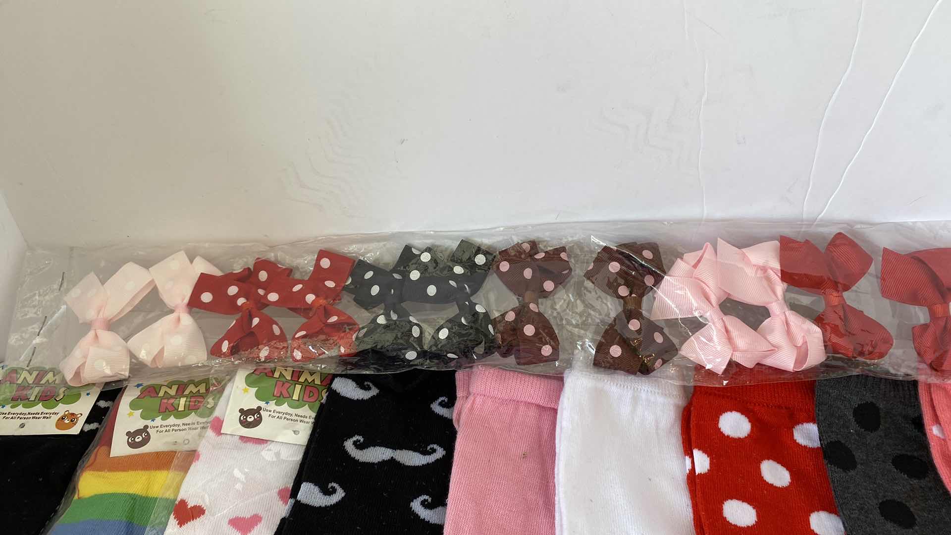 Photo 1 of GIRLS ACCESSORIES LEG WARMERS AND BARRETTES