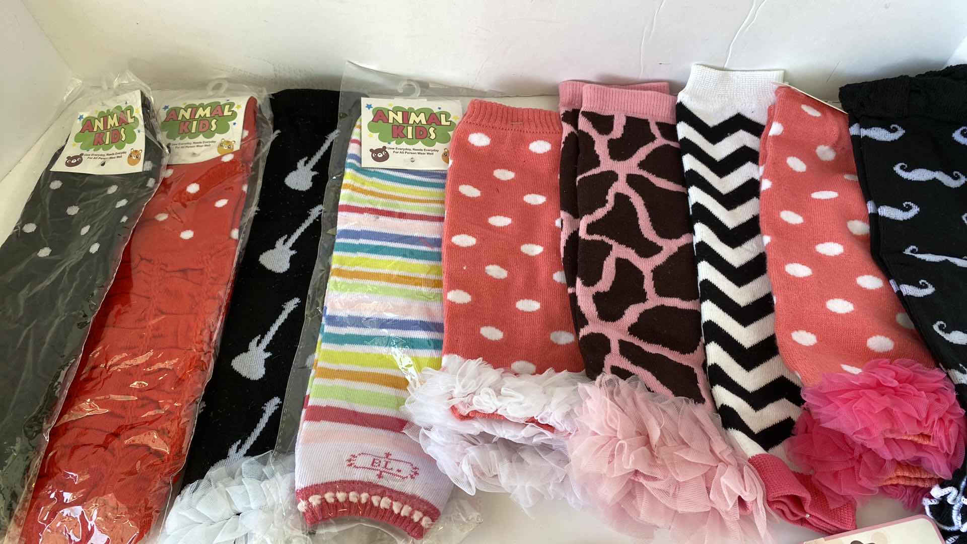 Photo 1 of GIRLS ACCESSORIES LEG WARMERS AND BARRETTES