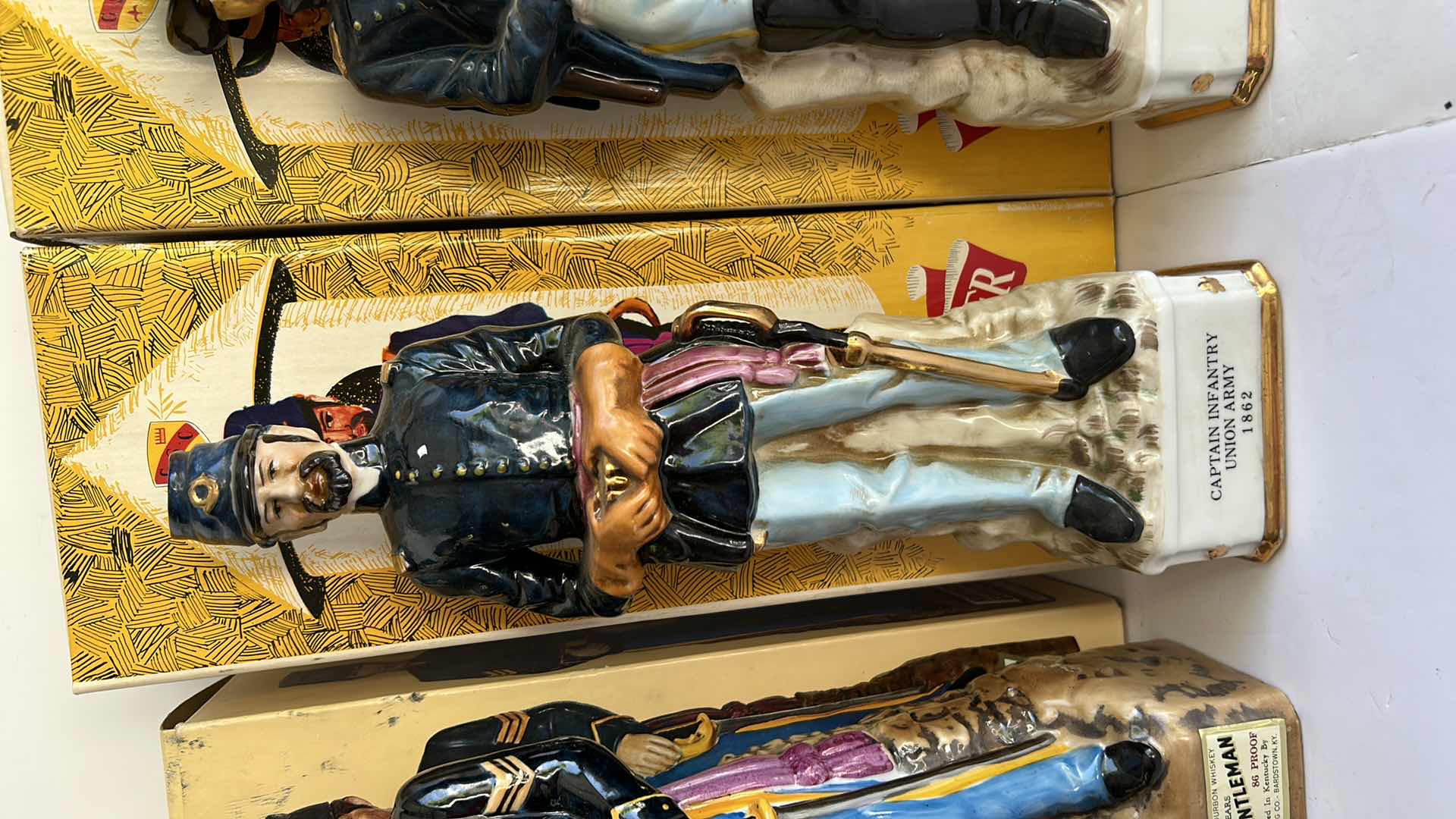 Photo 1 of RARE VERY LIMITED EDITION COLLECTION - 4 GENUINE HAND PAINTED PORCELAIN COLLECTIBLES, EACH IS SIGNED AND DATED  H14” (no alcohol) EMPTY BOTTLES