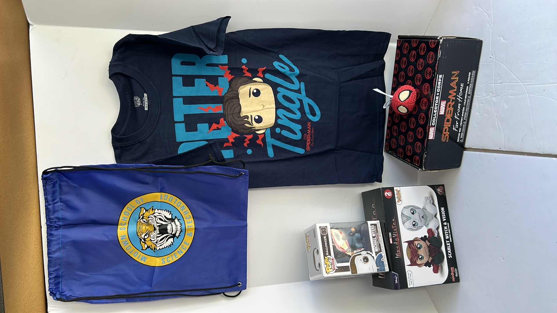Photo 1 of NEW MARVEL AND POP TOYS PLUS MYSTERY BOX WHICH INCLUDES XS TEE, BAG AND CROCHETED SPIDER MAN BEAN BAG