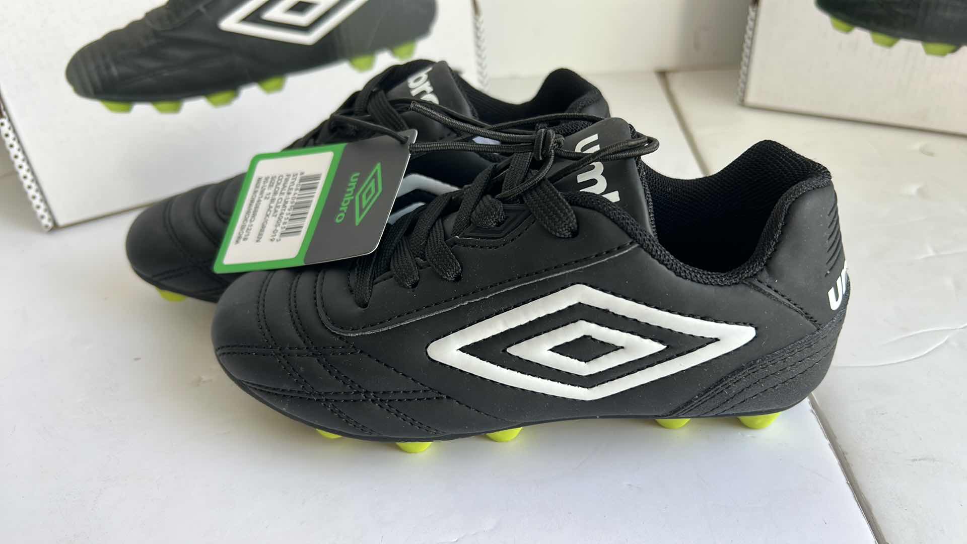 Photo 1 of 3 PAIRS NEW CHILDS SOCCER CLEATS SIZE 12