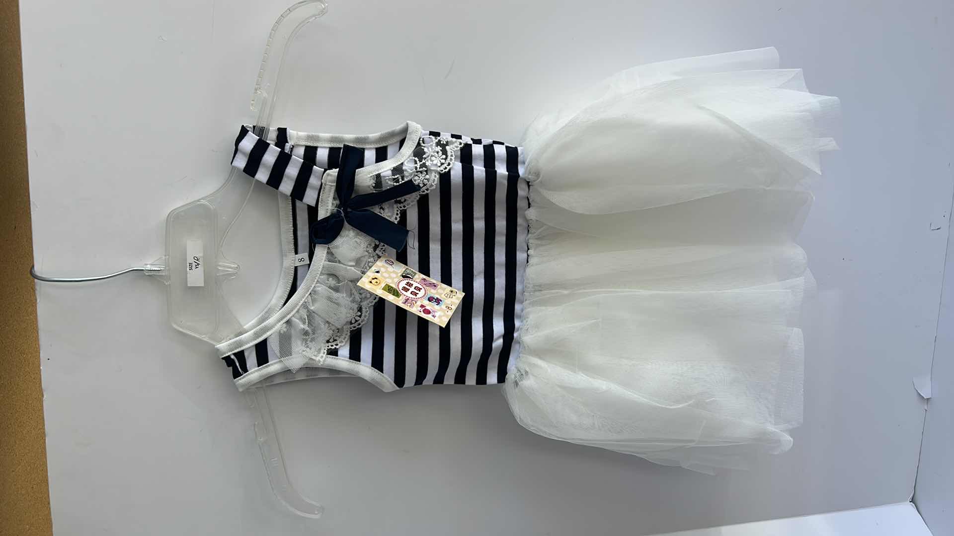 Photo 1 of THREE NEW CHILDRENS DRESSES SIZE 8-11