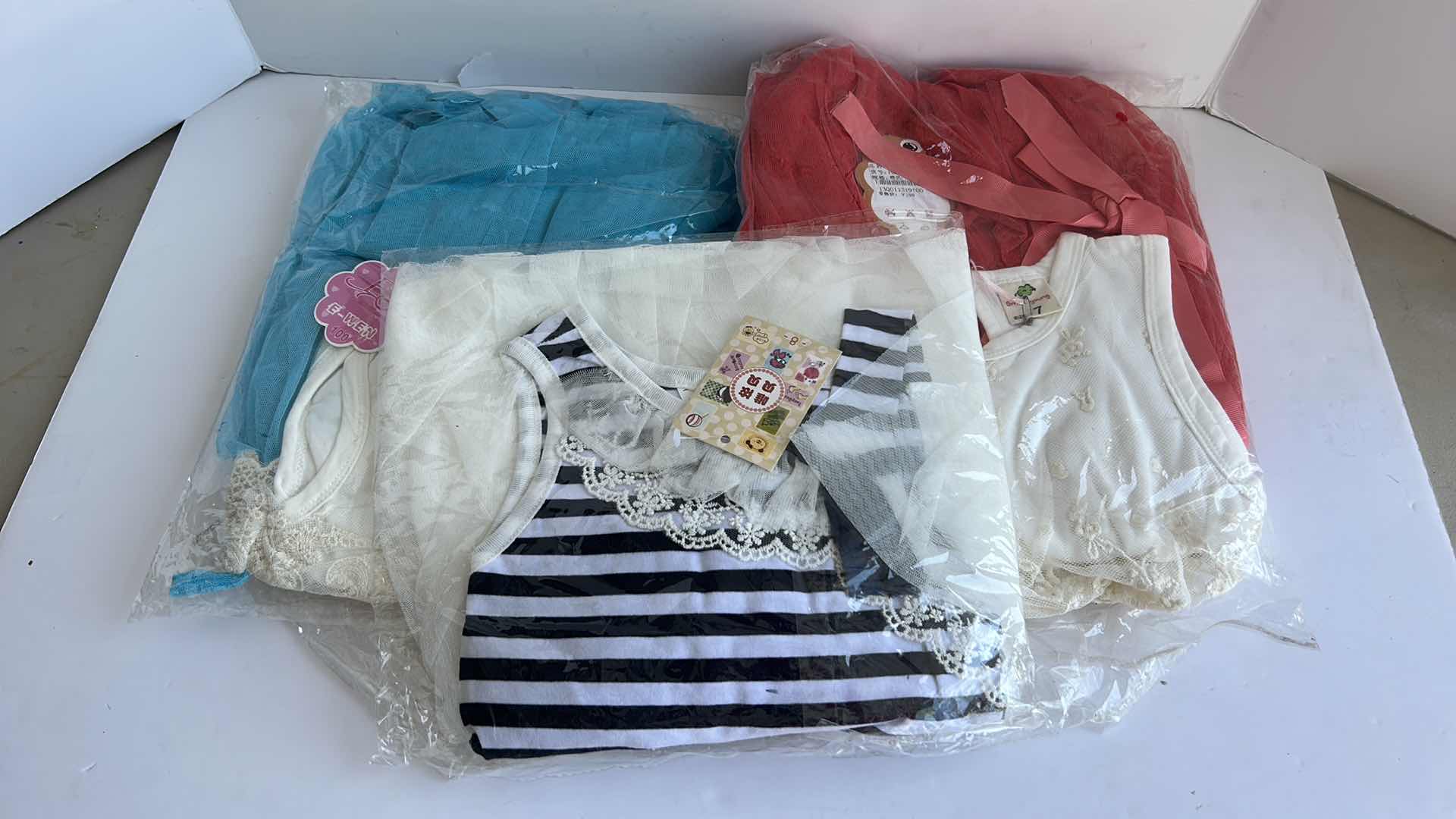 Photo 1 of THREE NEW CHILDRENS DRESSES SIZE 8-11