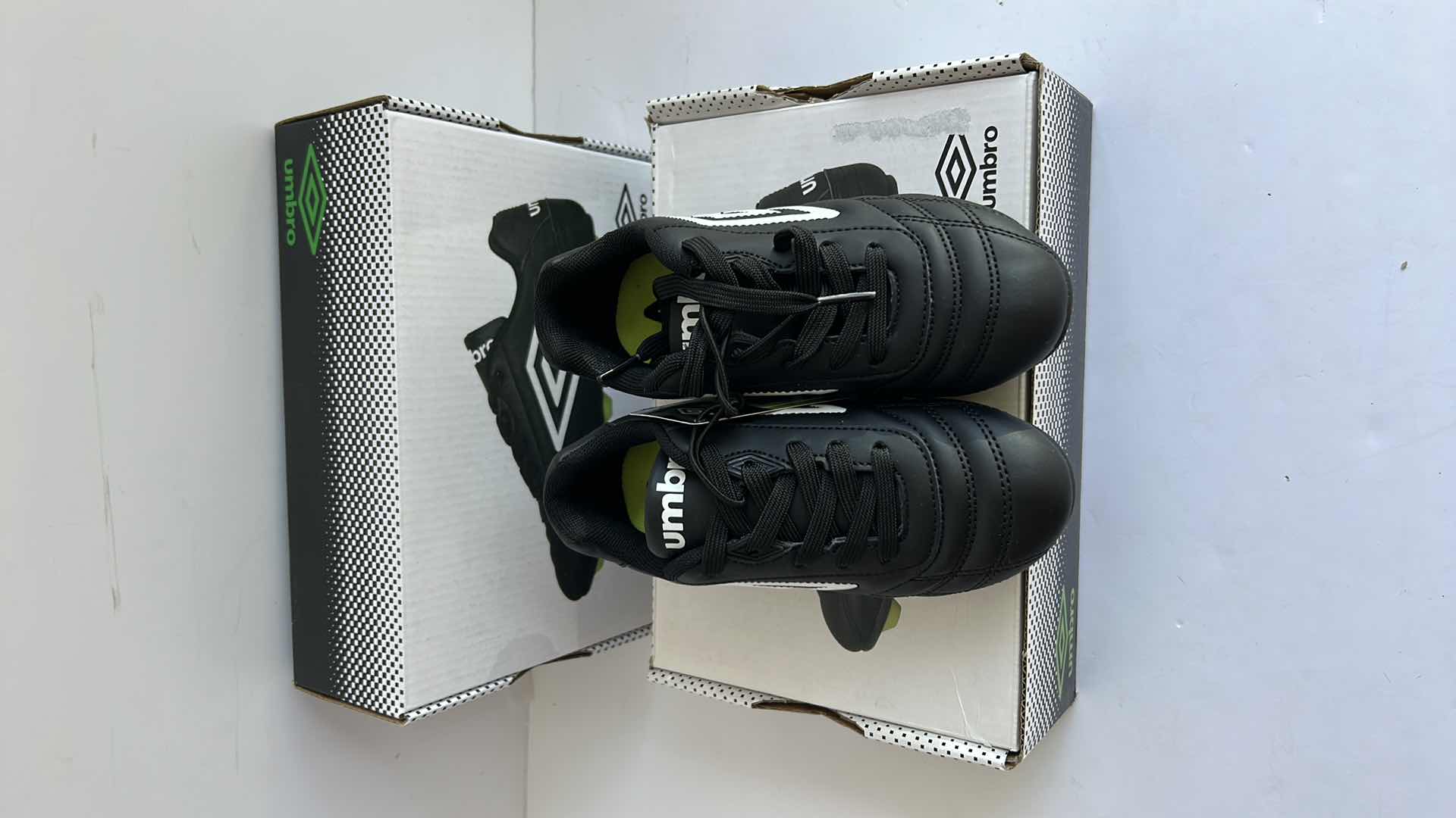 Photo 1 of 2 PAIRS NEW CHILDS SOCCER CLEATS SIZE 12