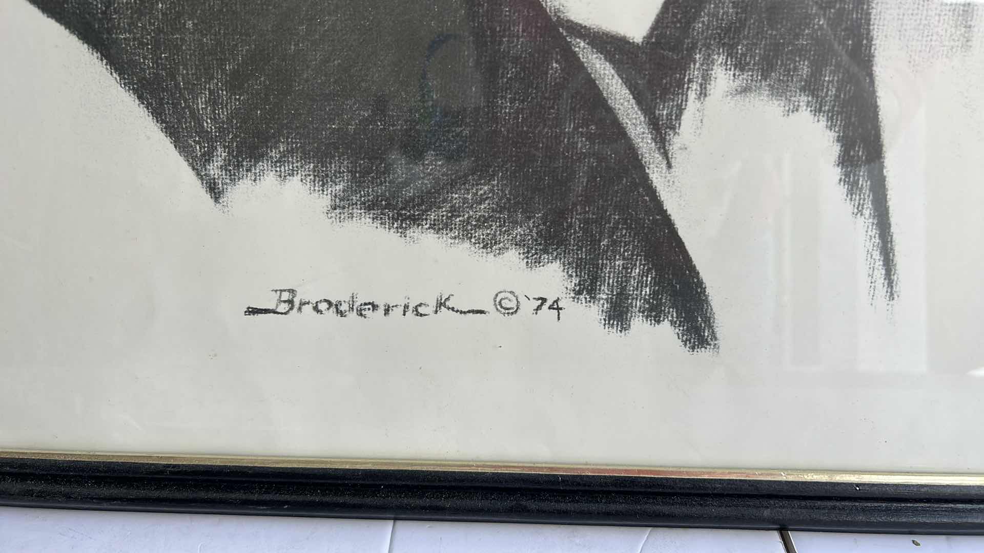 Photo 1 of BLACK FRAMED BLACK AND WHITE JOHN WAYNE ARTWORK BY BRODERICK ‘74 19.5” x 25.5”