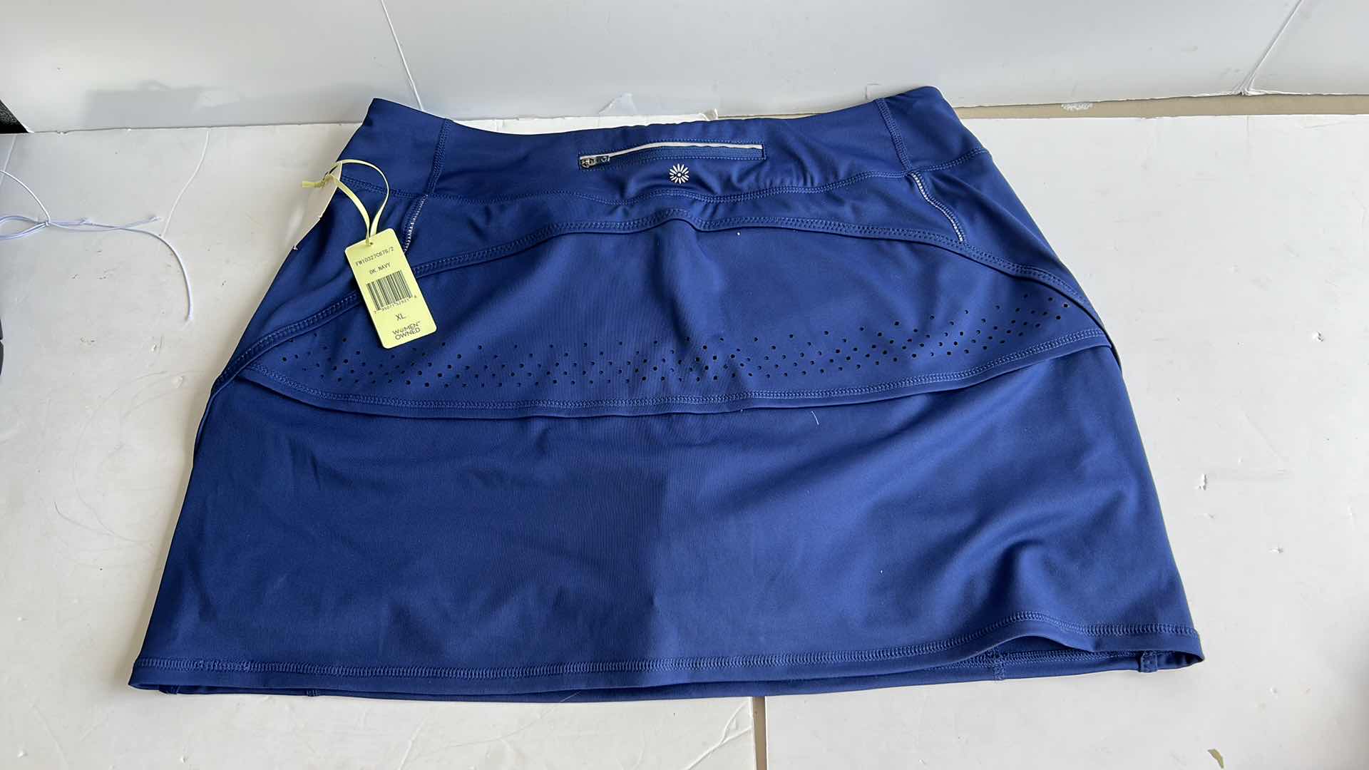 Photo 1 of NEW MEN AND WOMENS GOLF SHORTS AND SKORT