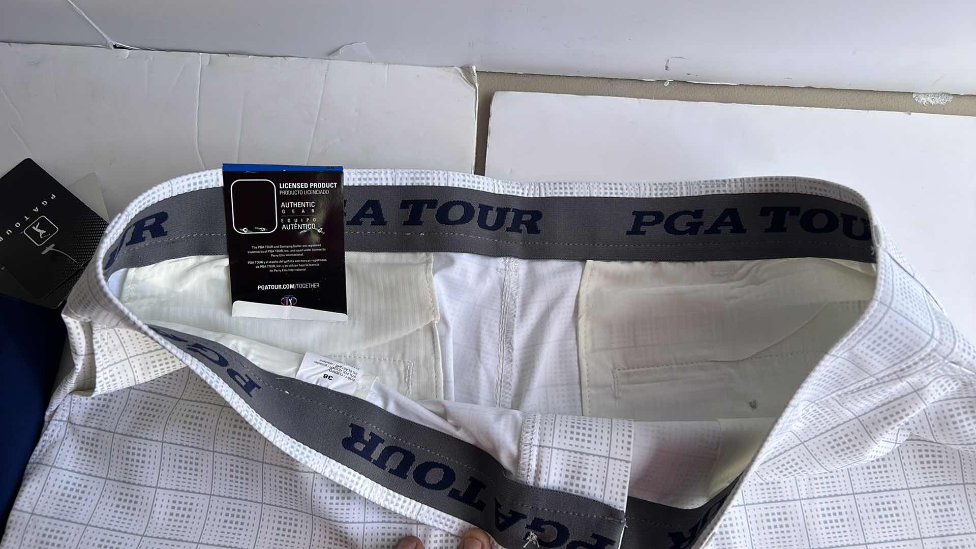 Photo 1 of NEW MEN AND WOMENS GOLF SHORTS AND SKORT