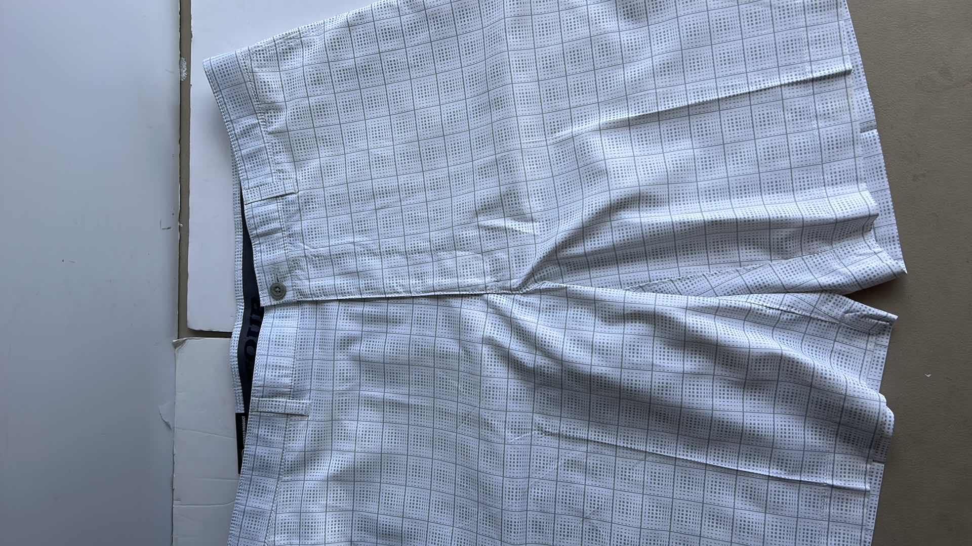 Photo 1 of NEW MEN AND WOMENS GOLF SHORTS AND SKORT